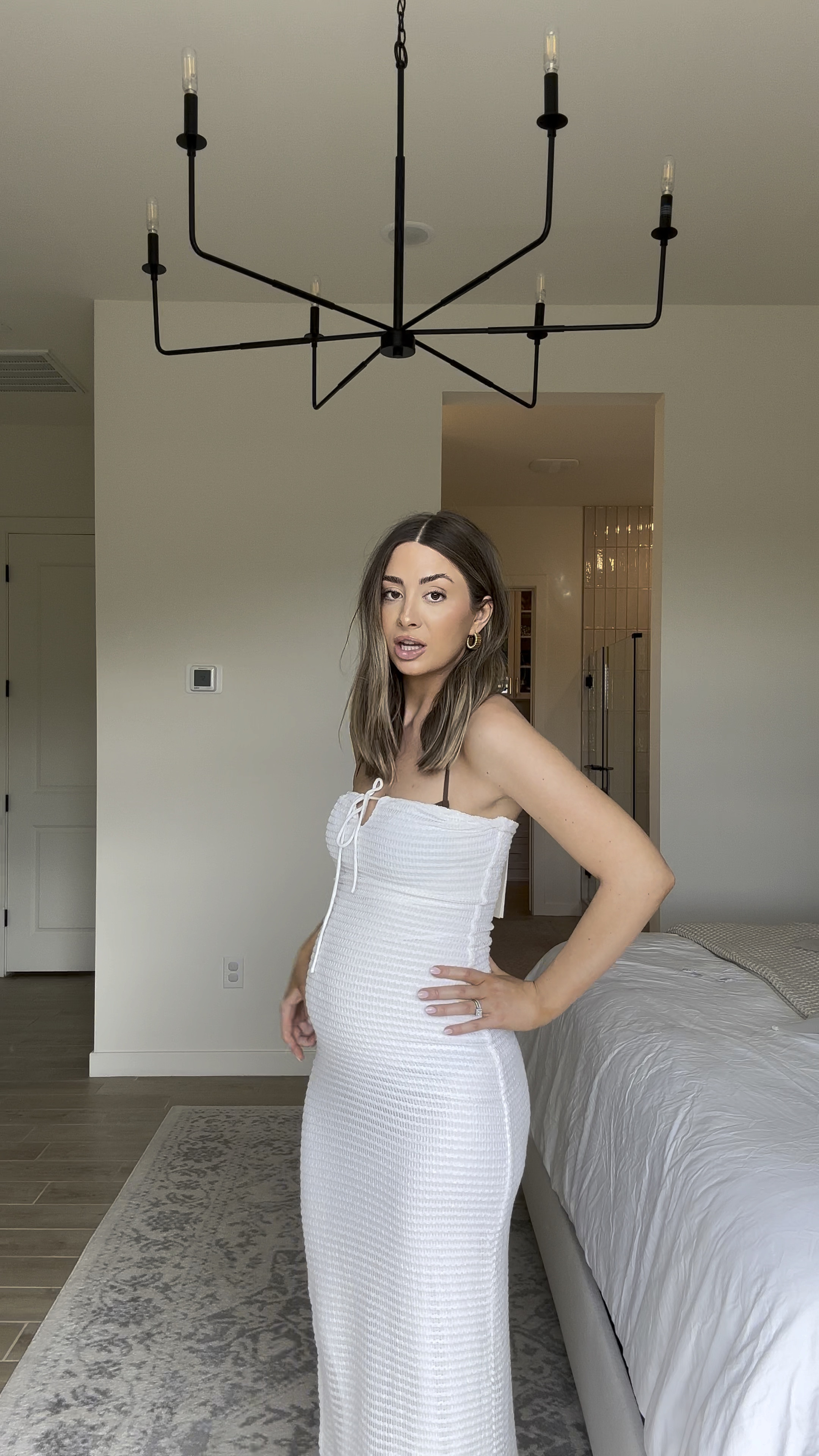 Love this for a beach vacation! Perfect swim cover up & bump friendly! Wearing a size small at 26 weeks and fits great! Get your regular size! 

#LTKbump #LTKfindsunder100 #LTKtravel