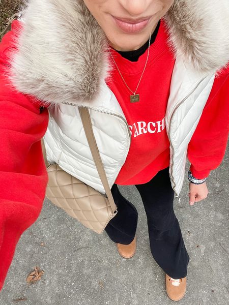 Winter outfit of the day
Puffer vest 
Graphic sweatshirt 
Flare leggings
Ugg boots, uggs 
Quilted crossbody bag
Gucci necklace 

#LTKSeasonal #LTKshoecrush #LTKstyletip