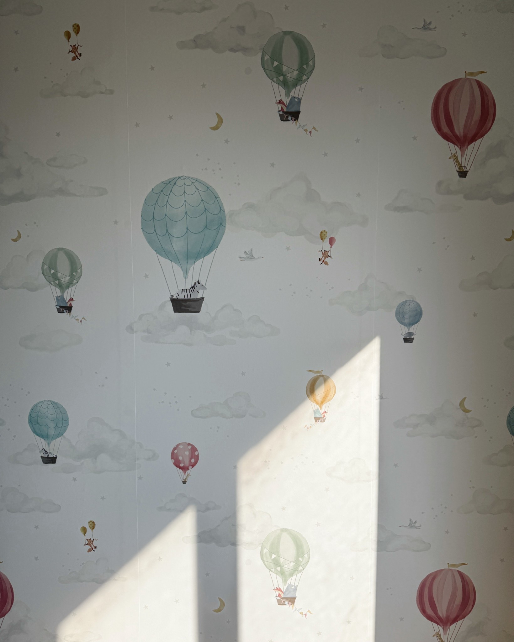 Peel and stick hot air balloon wallpaper for nursery and playrooms 

#LTKHome #LTKBaby