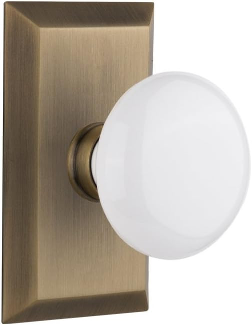 Nostalgic Warehouse 713393 Studio Plate with White Porcelain Knob, Privacy - 2.375", Antique Bras... | Amazon (US)