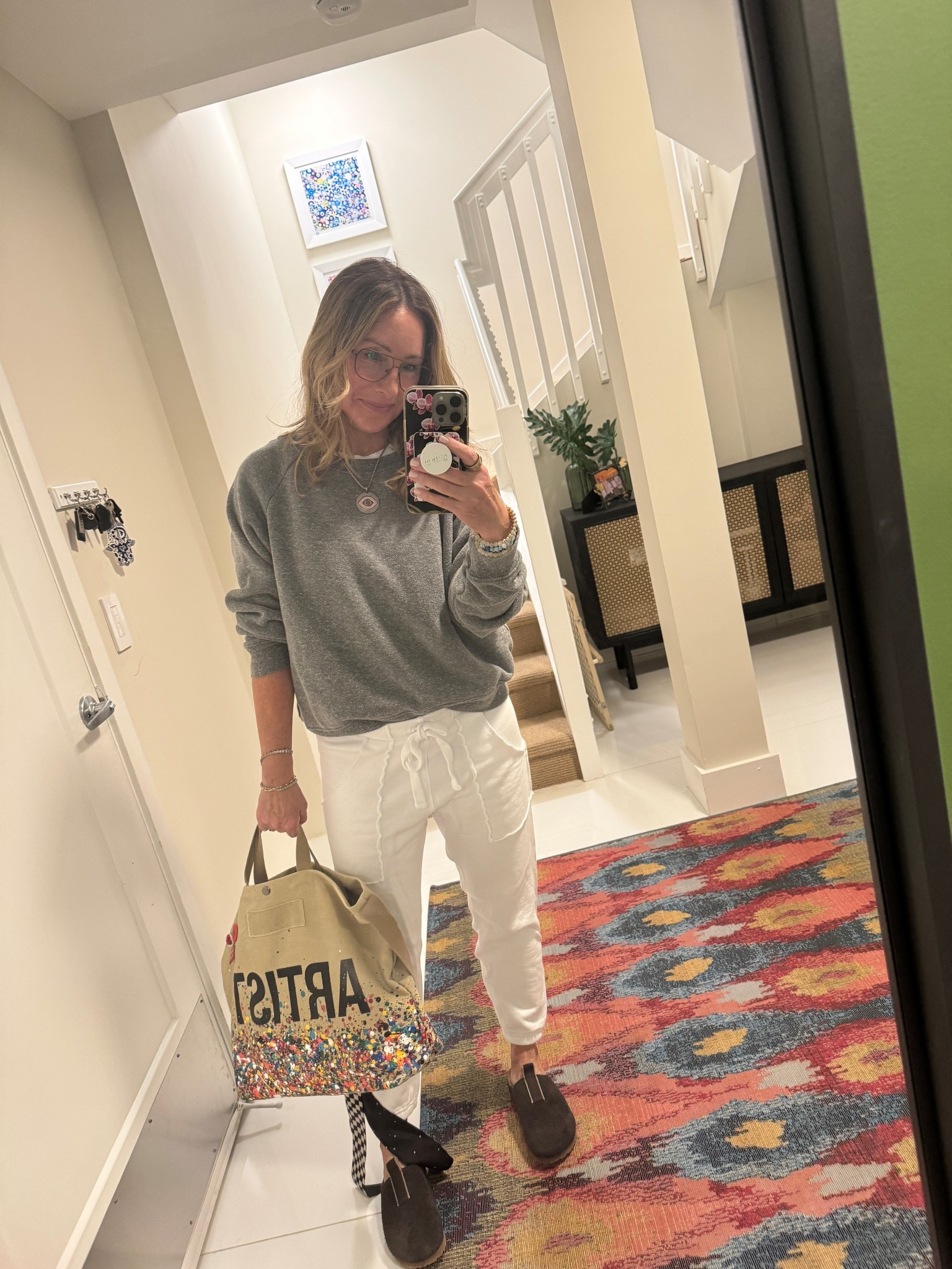 This week I had an evening Canasta game. So I wanted to wear comfy clothes but still look somewhat put together. Wearing one of my gray sweatshirts because I’m super addicted to these lately and totally obsessed with these clogs. They offer really good arch support and are kind of so ugly. they’re cool.

#LTKootd #LTKselfcare #LTKmomlife