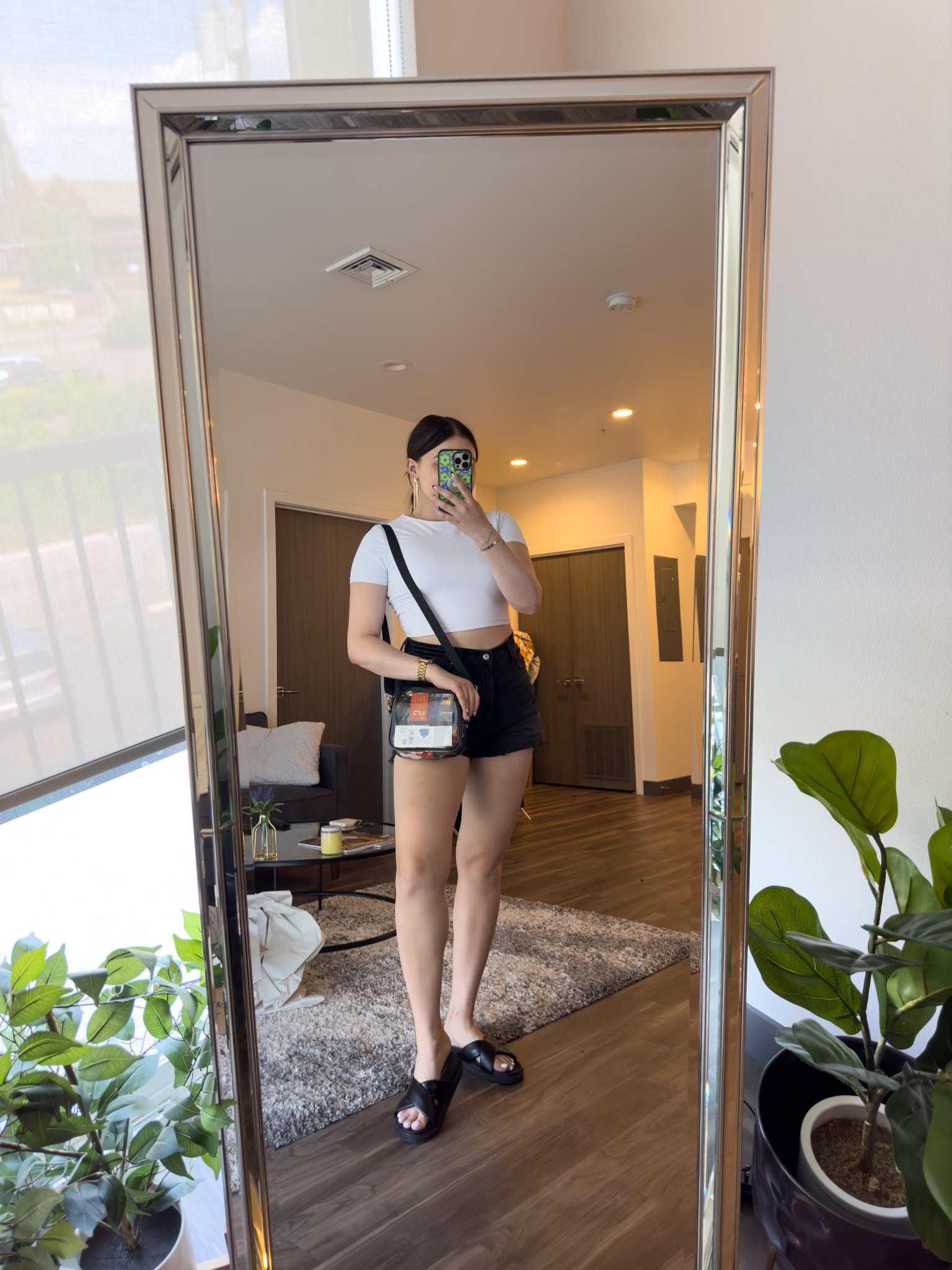 Casual black and white outfit idea for summer! Featuring my favorite black denim shorts. 

I’m wearing a M tee, size 31 shorts and size 9 sandals 

#LTKSeasonal #LTKunder100