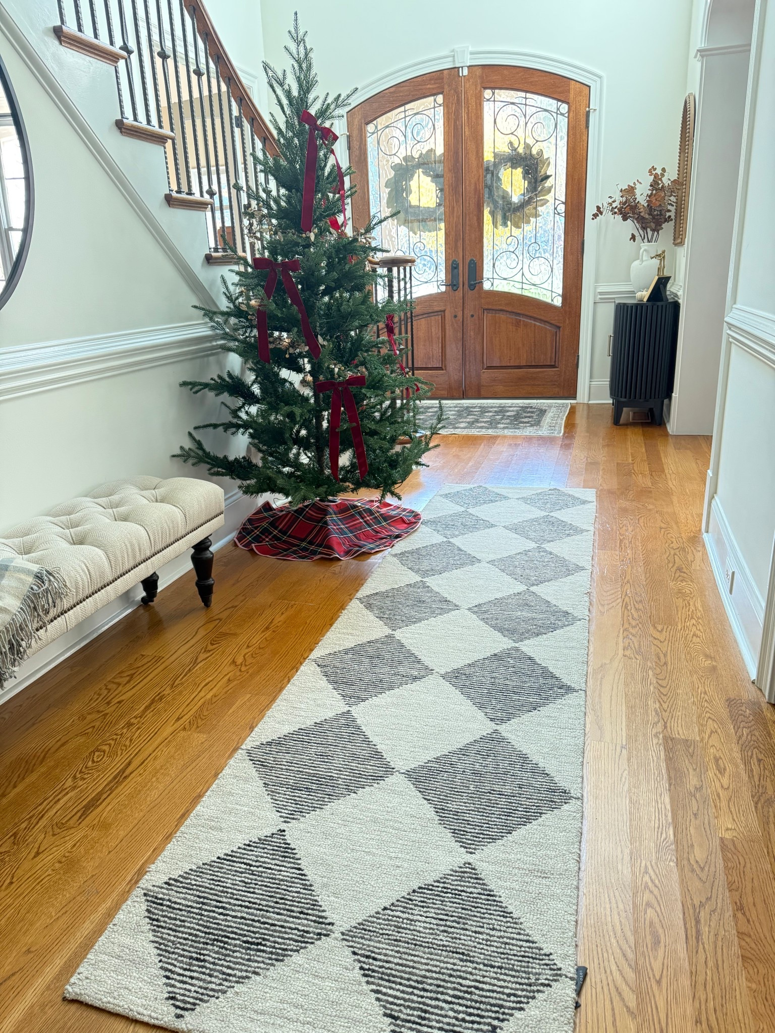 This checkered rug is even prettier at Christmas 🎄 

#checkeredrug 
Christmas decor
Checkered rug
Front entry decor

#LTKHoliday #LTKHome