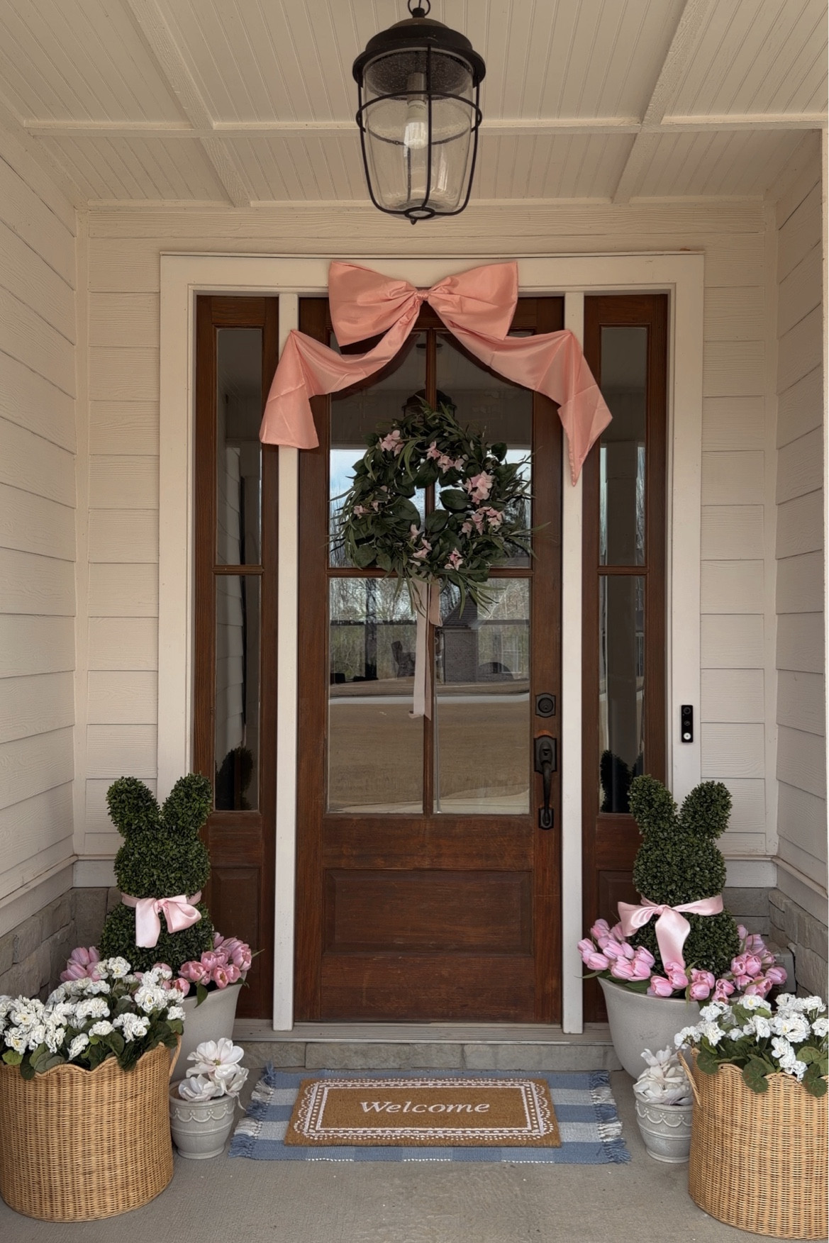 Spring porch
Easter decor
Bow
Urn planters
Basket planters
Bunnies
Gingham rug