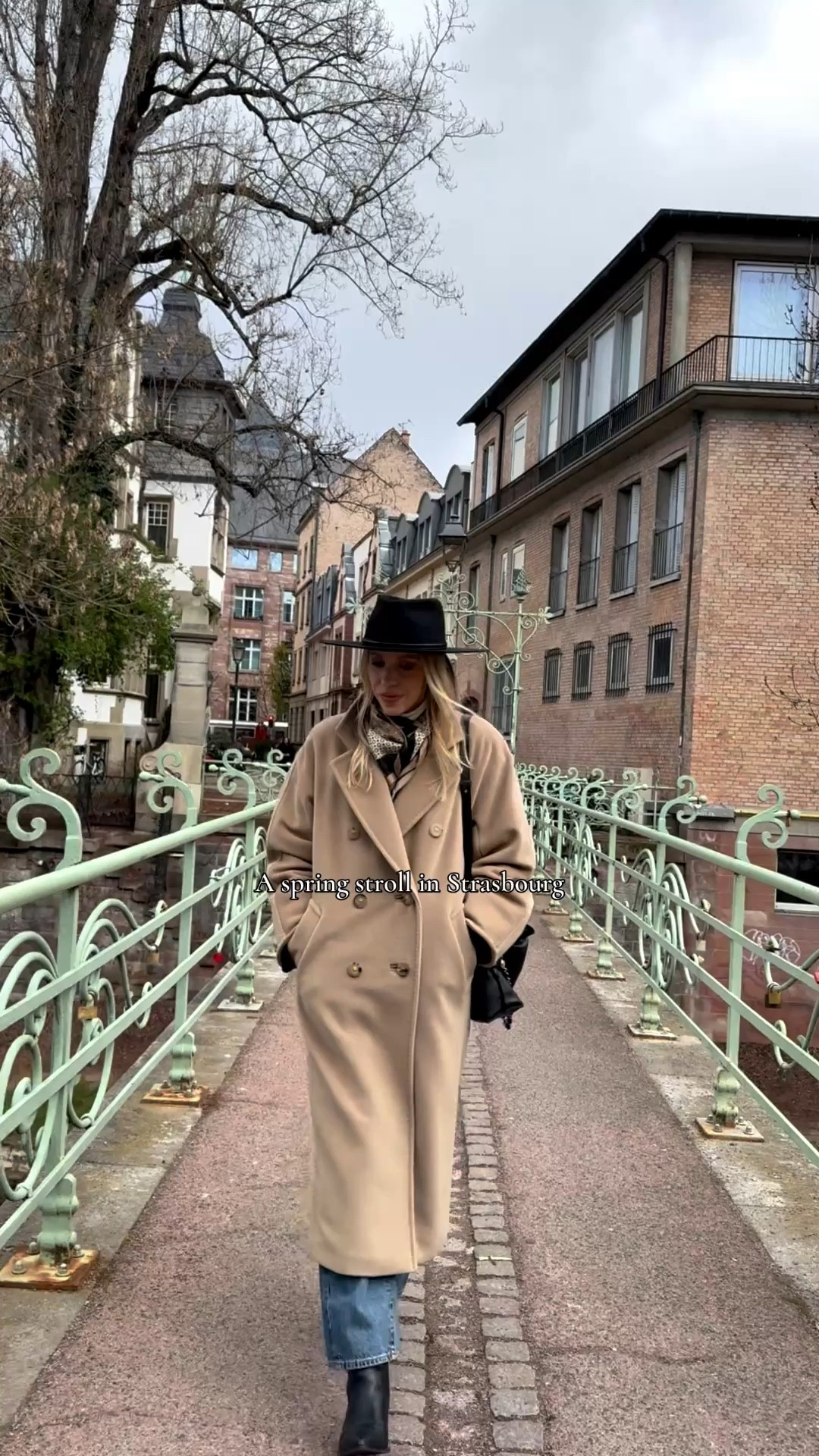 Spring travel style, camel coat, @Janessa Leone black wool hat, European vacation look, silk scarf outfit 

#LTKTravel #LTKOver40 #LTKSeasonal