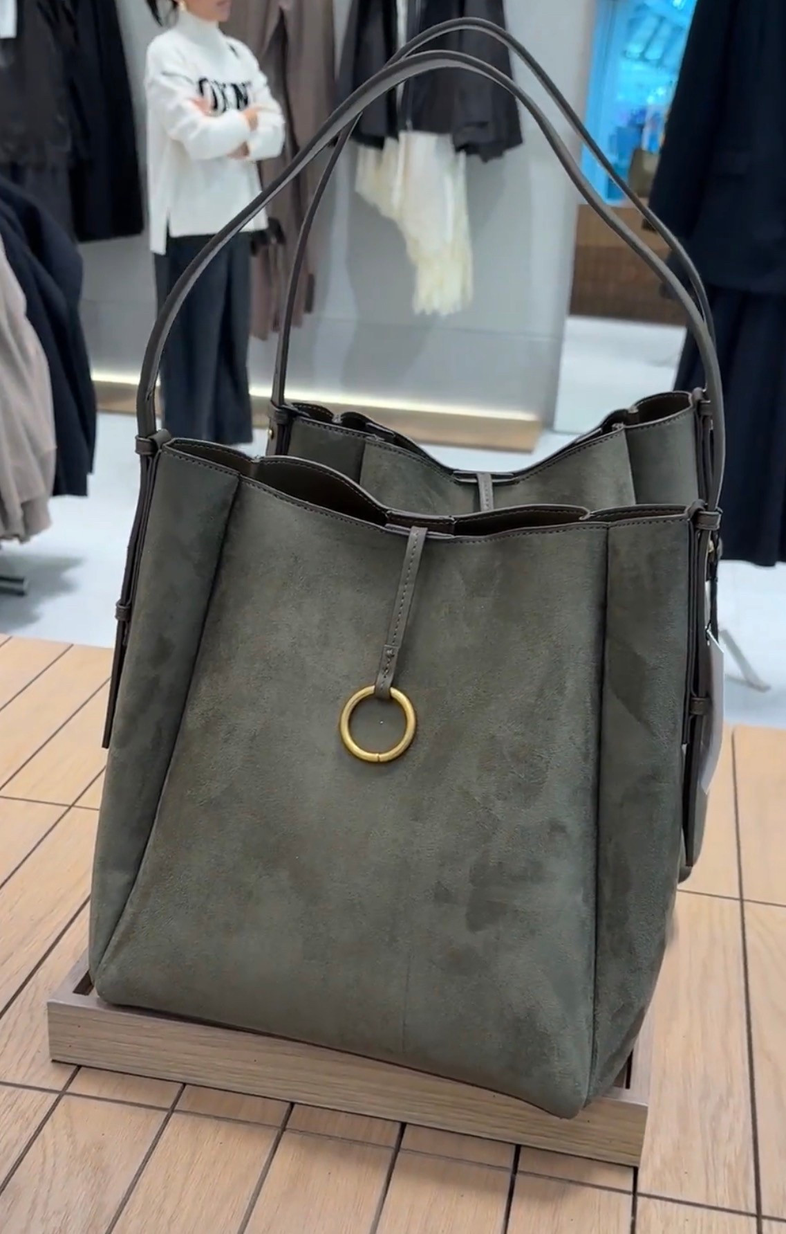 Suede bucket bag with metal detail! Pairs well with a ton of looks! 

#LTKootd #LTKFindsUnder100