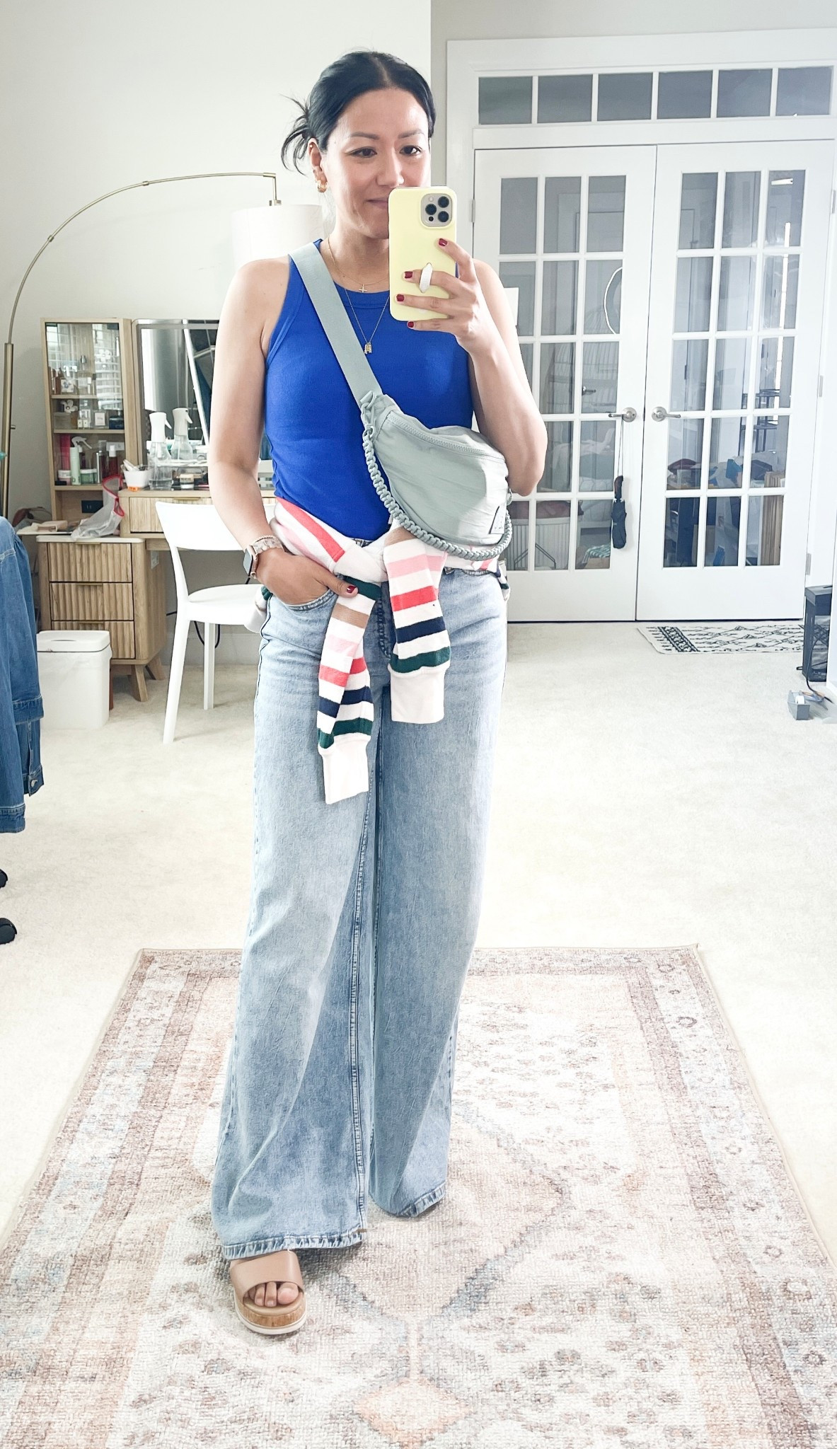 Size 2 jeans, size extra small tank, size small hoodie, shoes are true to size

#LTKFindsUnder50 #LTKSeasonal #LTKSaleAlert