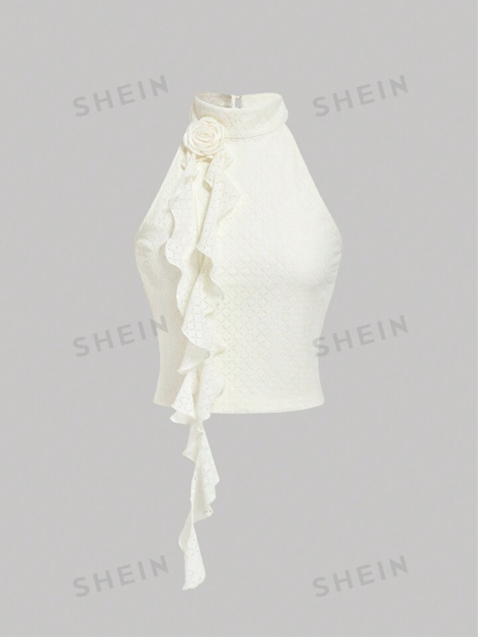 High-neck sleeveless top with tie back. Rose detail with ruffle flow!

#LTKSummerSales #LTKFindsUnder50 #LTKSaleAlert