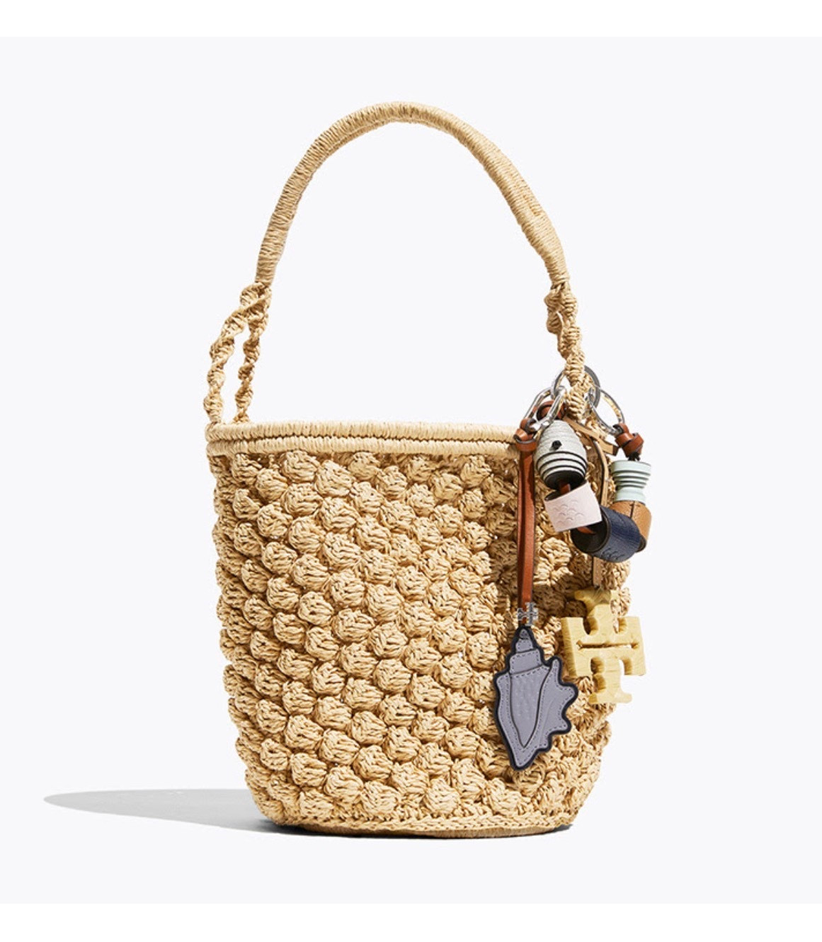 Ella Hand-Crocheted Popcorn Bucket Bag
Inspired by the art and traditions of basketry, Ella Hand-Crocheted Popcorn Bucket Bag is crafted in paper raffia with textured popcorn stitch and your double T charm. Add additional charms to inspire your destinations.

#LTKSeasonal #LTKWorkwear #LTKTravel
