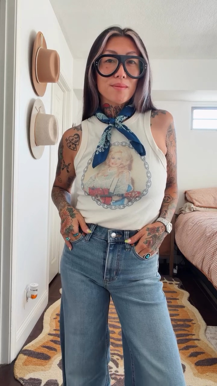 It’s Thursday. Come on, let’s get dressed 💙

Time to meet Baby Lola so minimal accessories so we can get all the snuggles 🥰

Top: chainlink Dolly tank (thrifted find)
Jeans: wide leg high rise @target 🔗 in my LTK
Rings: @americandecaychicago 
Bandana: no. 157 “Maggie” @handker_bandanas (use code: emily15 for a discount😘)
Glasses: the Carlton @efeglasses_official 
Watch: the Coda @bredastudio 
Shoes: @converse