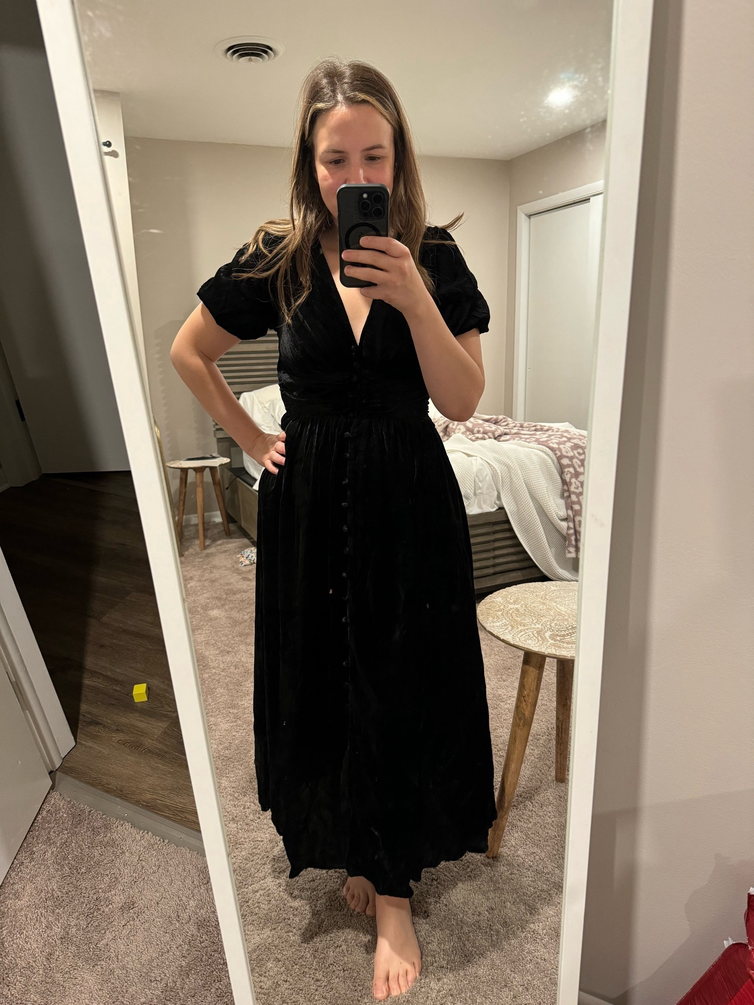The cutest black midi velvet button dress from Anthropologie - comes in plus sizes. Perfect for holiday party or holiday family photos 

#LTKSeasonal #LTKHoliday #LTKCyberWeek