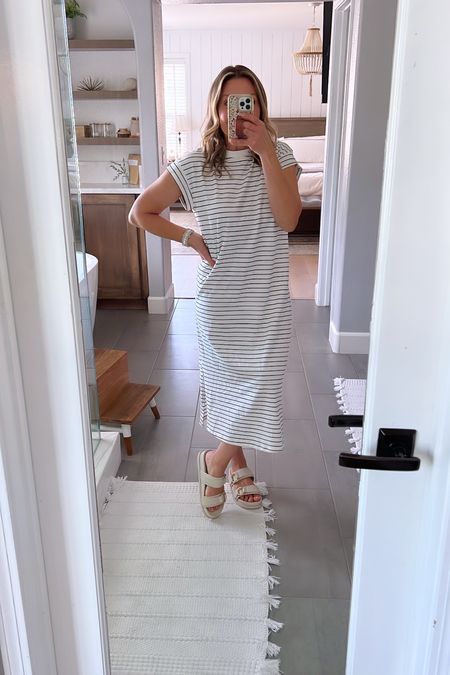 Navy and cream striped loose fit t-shirt maxi dress. Super comfortable. Perfect for spring and summer. Doubles as a swim cover up. Would be so cute on a cruise and a great dress for travel and vacations.

Paired with these super cute chunky sandals. Elevated Birkenstock vibes. Incredibly comfortable. 

#LTKfindsunder50 #LTKtravel #LTKover40