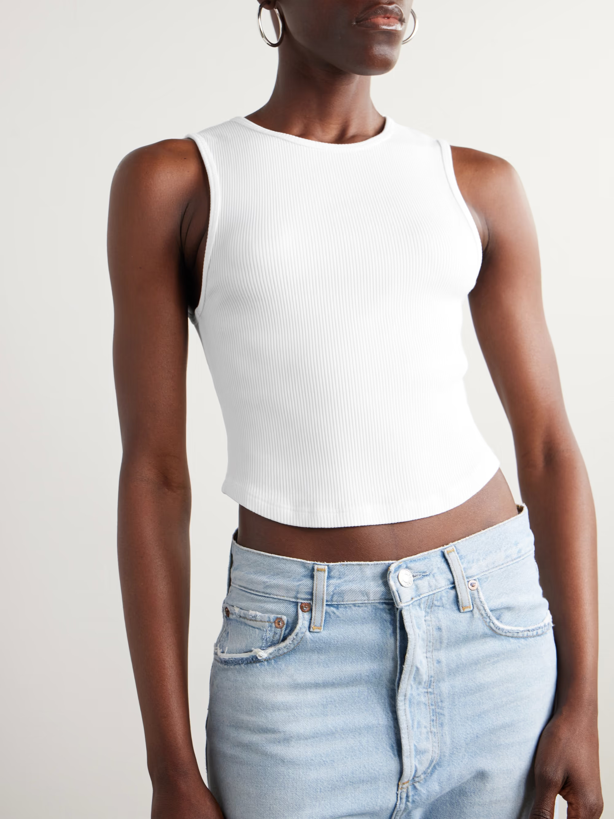 AGOLDE's 'Nova' tank is cut from organic cotton and TENCEL™ Lyocell and blended with the perfec... | NET-A-PORTER APAC