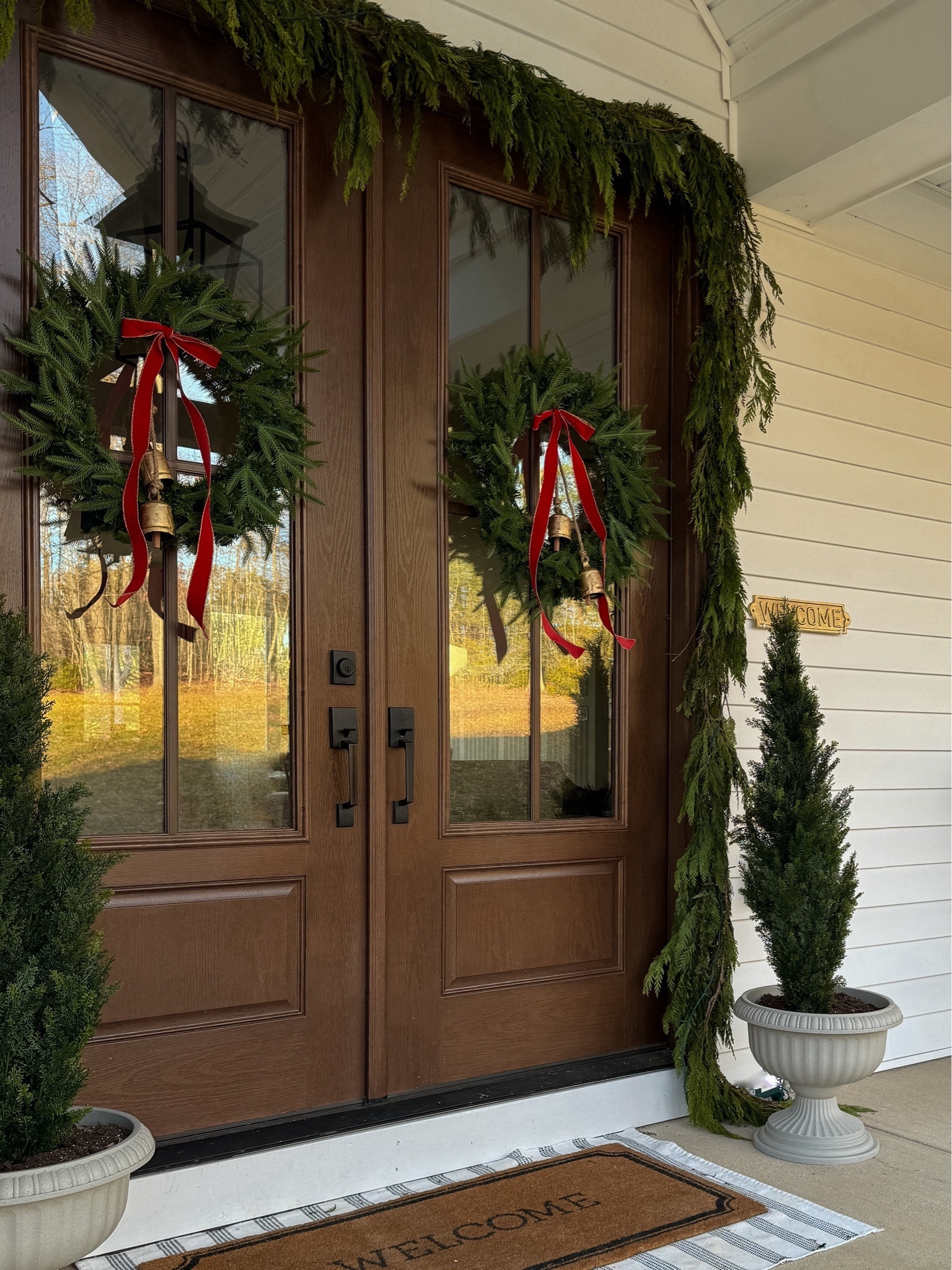 Front porch
Christmas decor
Double doors
Cedar tree
Winter wreath


#LTKHoliday #LTKhome