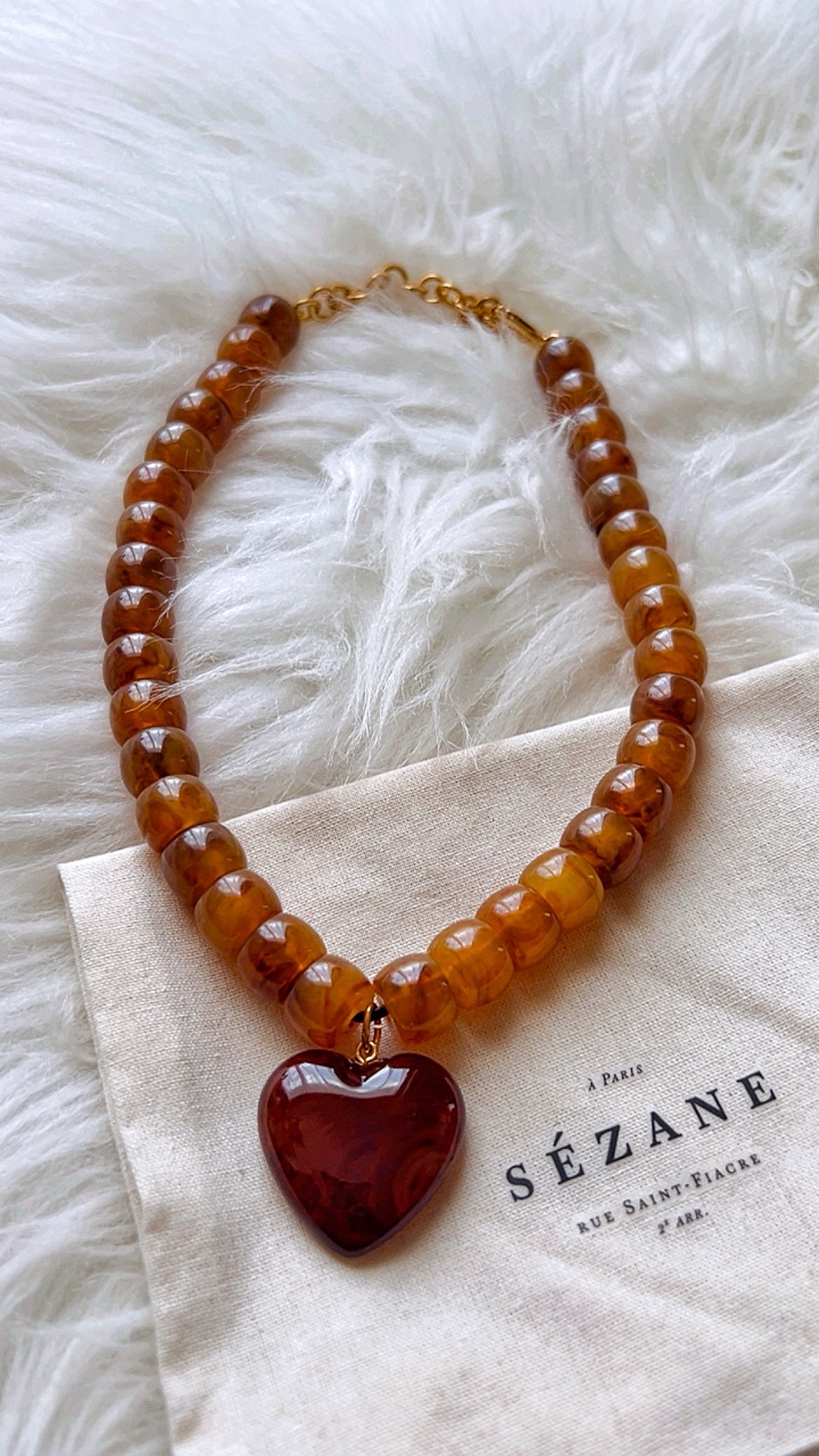 Sezane Jewelry - Claude Necklace

Beautiful jewelry pieces that makes a great gift and they come with a pouch and beautifully decorated box.

Colored beads, Gold jewelry, Fashion jewelry, Red earrings, Accessories, heart necklace, heart pendant, puff heart necklace, beaded heart necklace #LTKFindsUnder100 #LTKOver40 #LTKStyleTip

#LTKWorkwear #LTKMidsize #LTKSeasonal