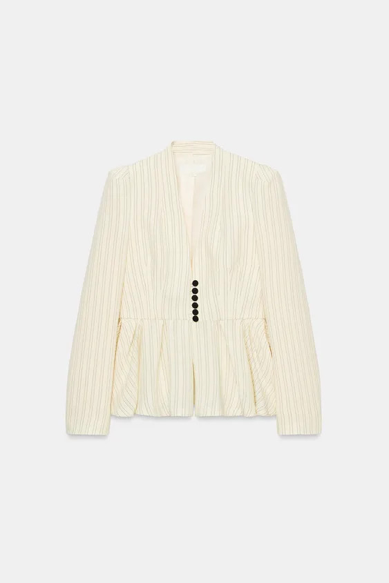 Blazer with a collarless neckline, long sleeves and shoulder pads. Featuring a flared hem with pl... | Zara IT