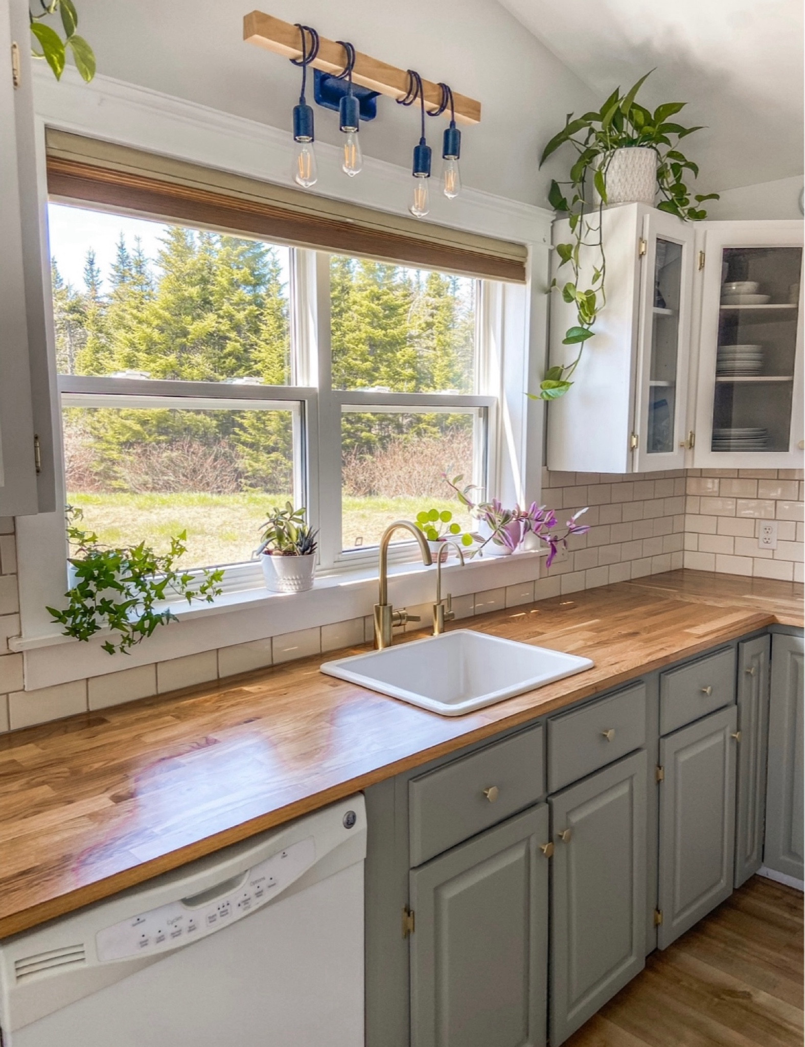 My viral kitchen makeover 🎉 linking the light fixture I always get asked about! 

#LTKhome