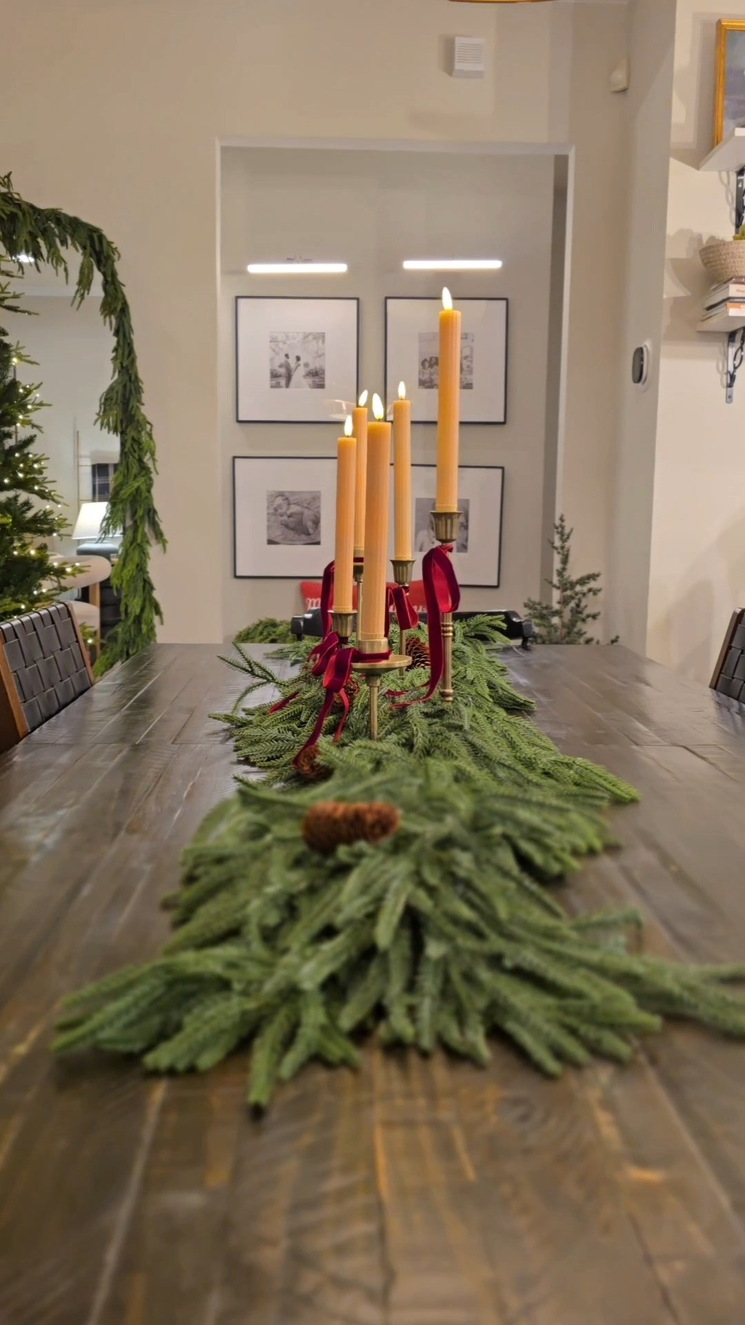 This Norfolk Pine garland is the best amazon Norfolk pine I've used. Linked an alternative too. Add battery operated taper candles and ribbon and call your Christmas centerpiece done. 🎄 

 #LTKSeasonal #LTKHome #LTKSaleAlert