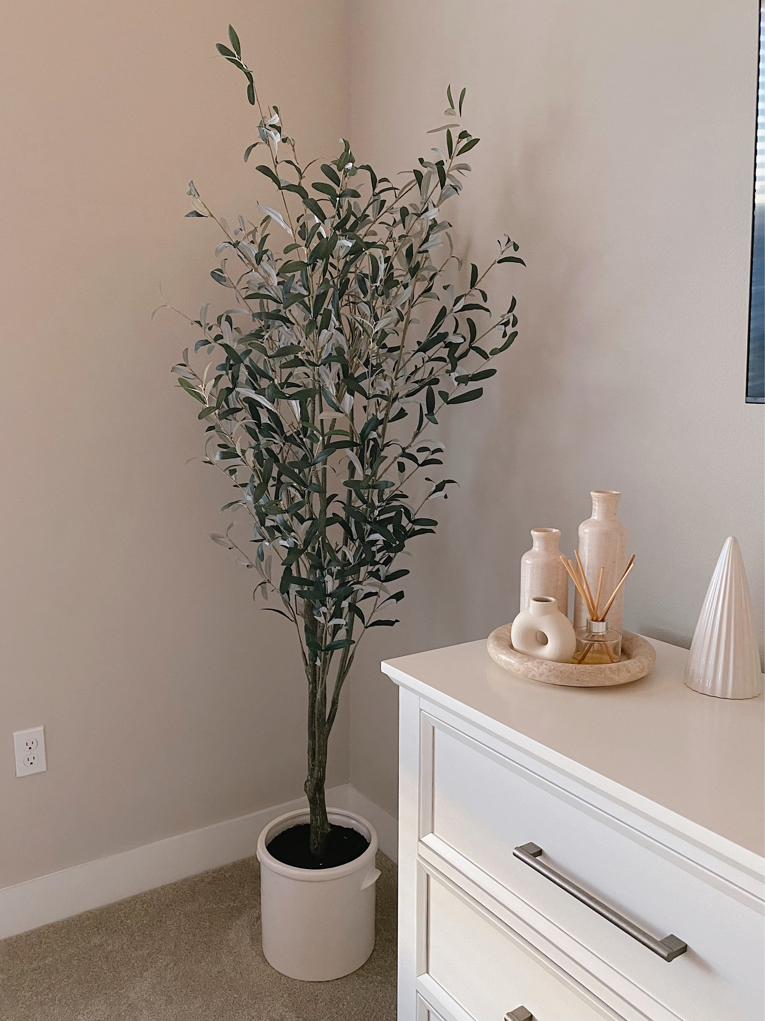 Snagged this faux olive tree on sale from Target!

#LTKstyletip #LTKhome #LTKsalealert