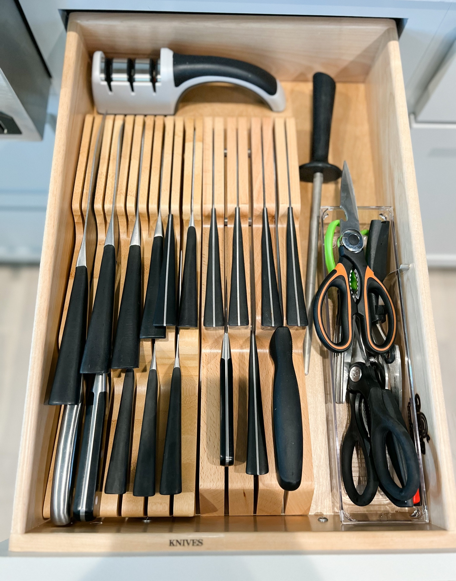When it comes to organizing sharp objects we think of our clients’ safety first! The wooden knife organizer that sits right in your kitchen drawer has a spot for each knife and is safe!

#LTKfamily #LTKhome