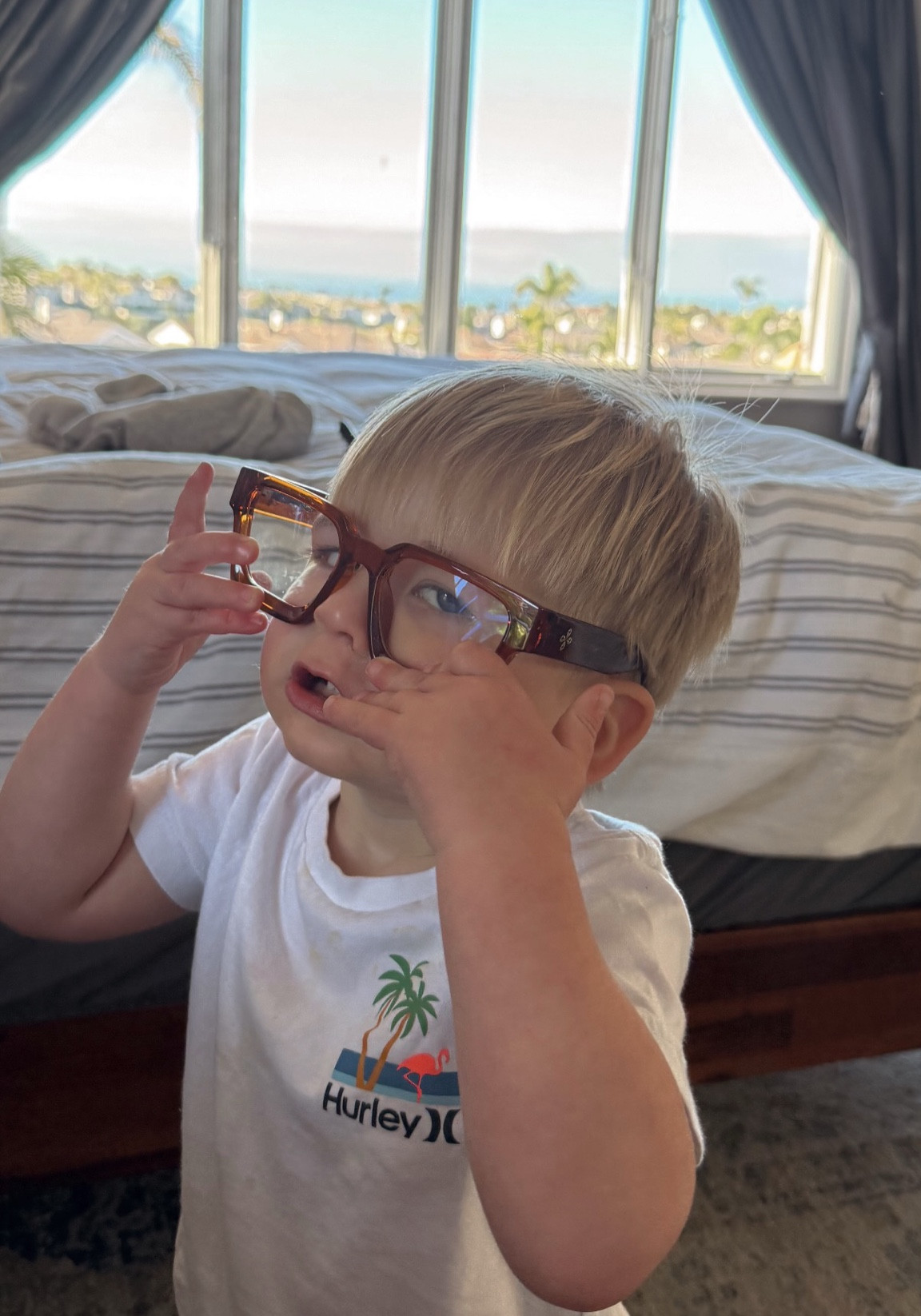 Baby boy trying out my glasses! Love these blue light glasses from amazon! 

#LTKStyleTip #LTKFindsUnder50 #LTKMostLoved