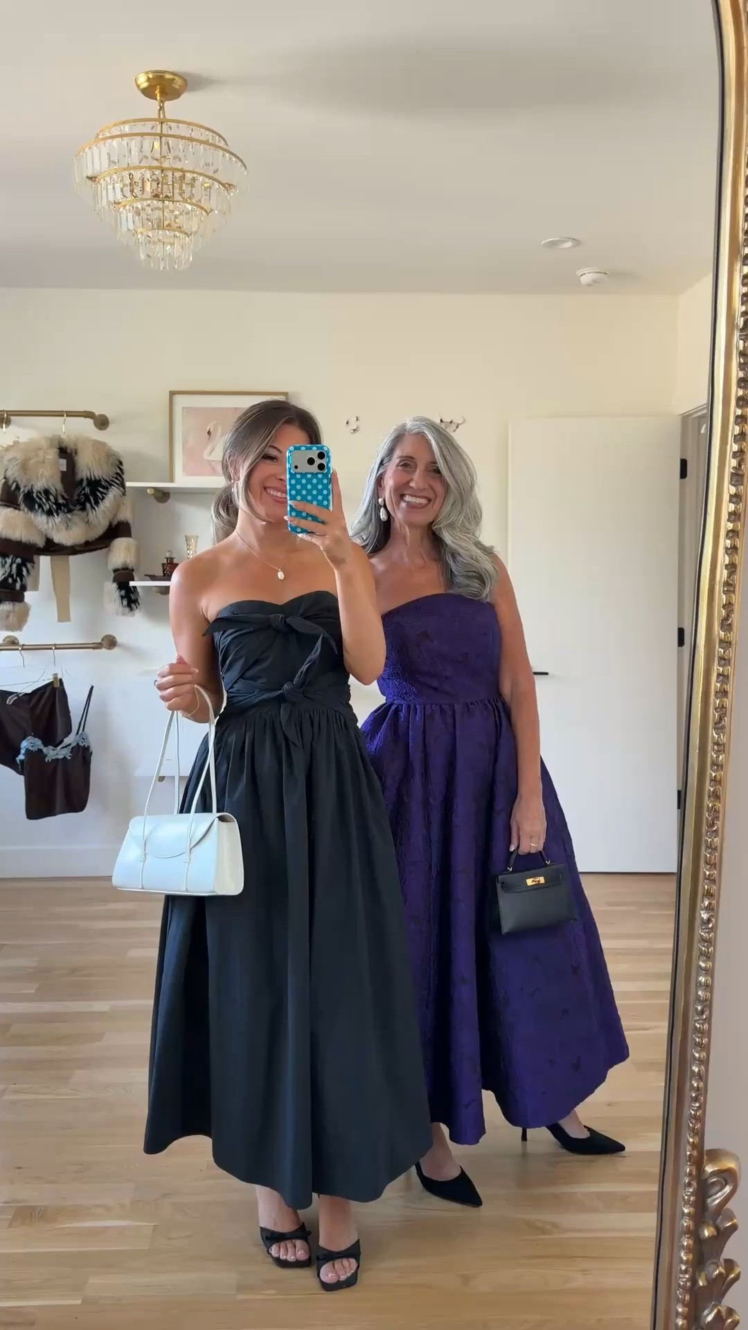 black strapless midi with a sweetheart neckline and two bow details, purple brocade strapless dress with a floral pattern mom and me formal wedding guest and mother of the bride dresses 💍✨

revolve code: tulip
Mac Duggal: emerson10

I’m 5’4” and wear a size small/2 
- sized down to xs
mom is 5’4” and wears a medium/6
- size down to a 4 

fall wedding guest dresses, wedding guest dresses, cocktail dresses, semi-formal dresses, black tie wedding guest dresses, destination wedding guest dresses, garden party dresses, wedding guest outfit ideas, mom & me outfits, mom & me dresses, matching outfits, mother daughter outfits, family photo outfits, wedding guest dresses, mother of the bride, mother of the groom, wedding guest outfit ideas