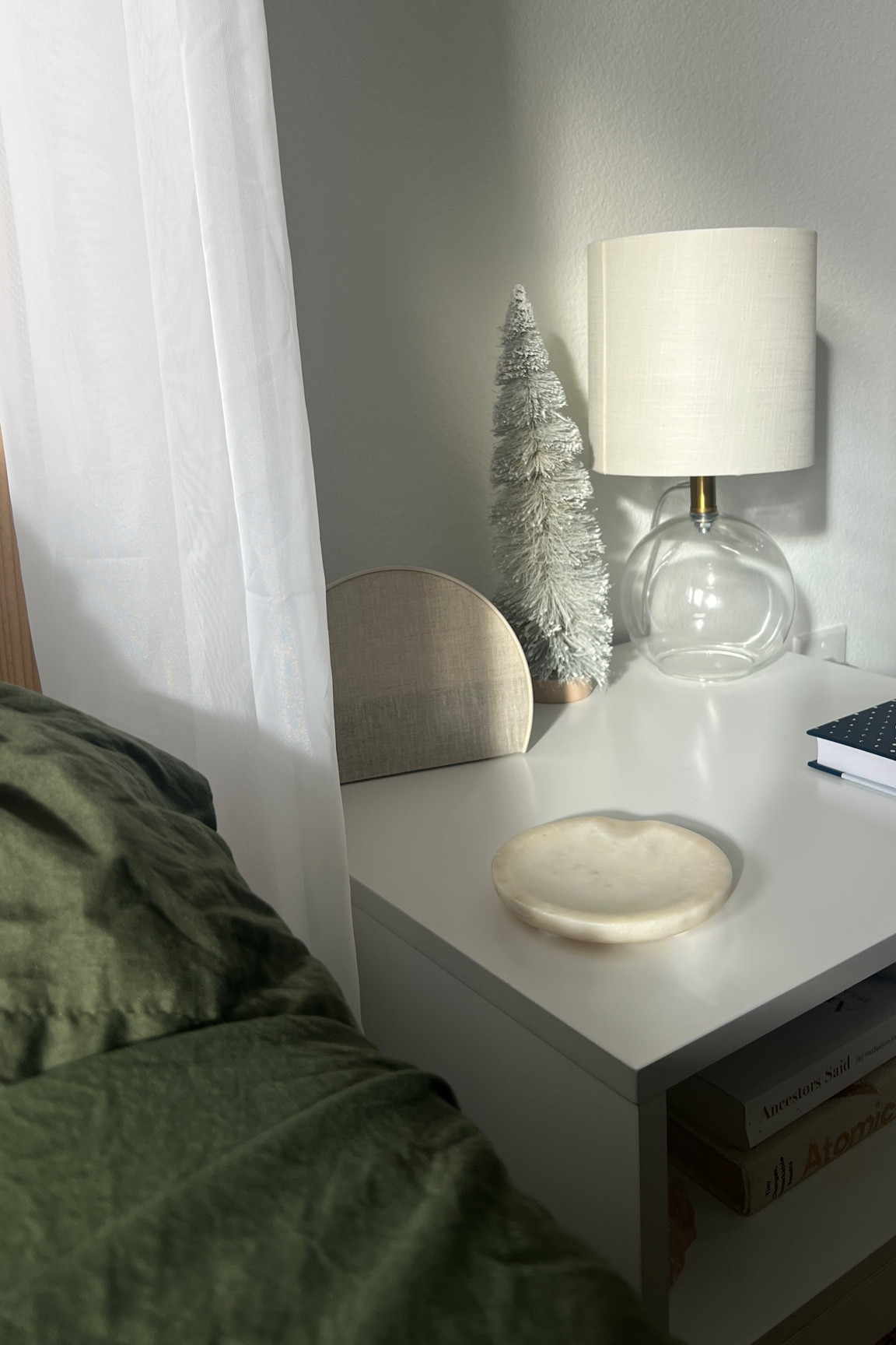 Switched up my nightstand for Christmas ✨🤍 still loving my Hatch Alarm Clock & green bedding! 

#LTKGiftGuide #LTKFindsUnder50 #LTKHome