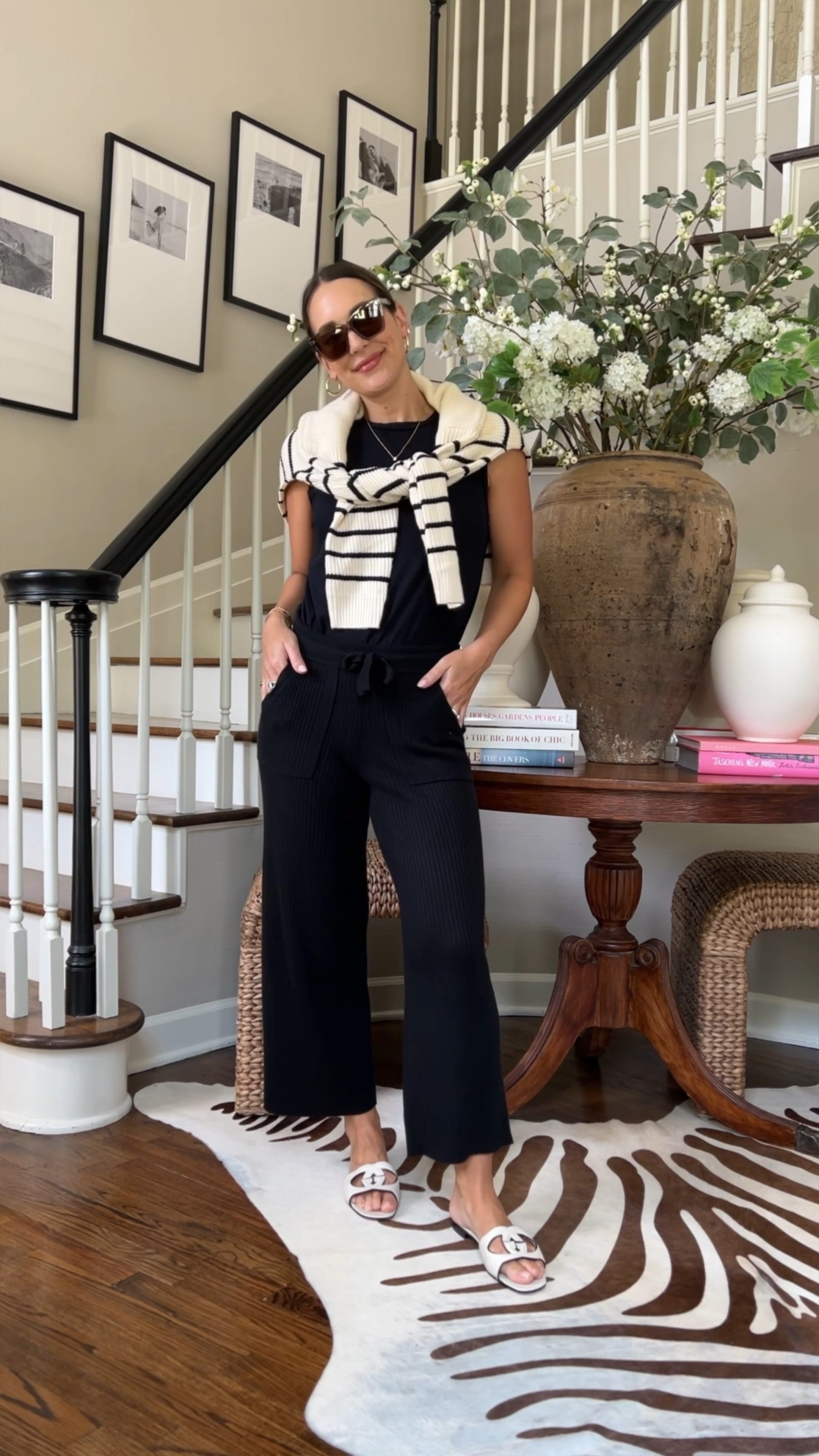 Loving these black cashmere blend pants. Has a matching top! I paired them with Gucci sandals, a white sleeveless tee and an Amazon striped sweater 