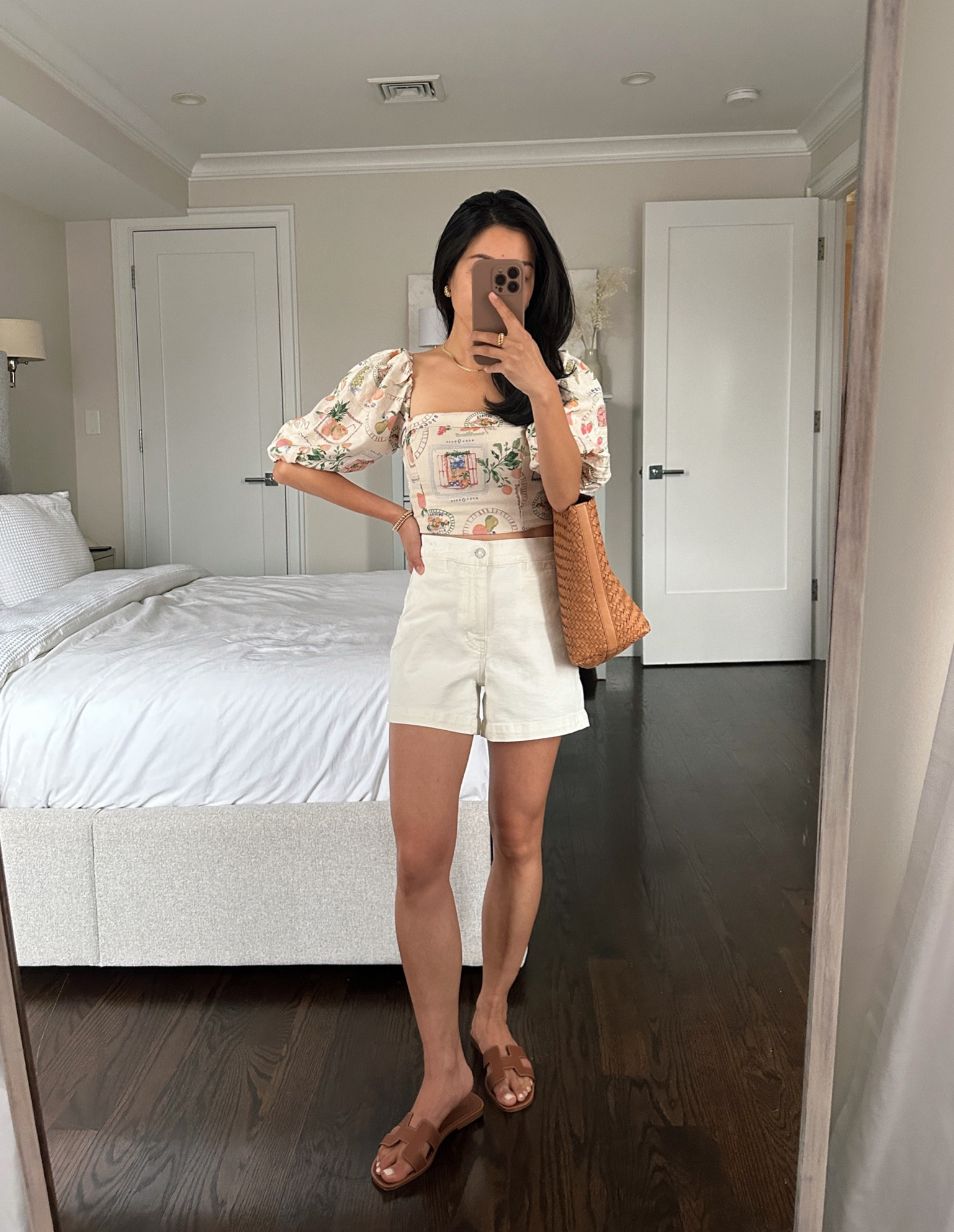 Last day for Madewell 25% off - these are the denim shorts version of the Emmett jeans and pants and the inseam length is a great mid length 

Compared to the elastic waist Madewell clean linen shorts (also Linked) these have a thicker weight, more structured chino- style fabric feel 

• Trying on Emmett shorts in size 24 and would need to size down in this color 

The white color shorts in 24 fits me a little big at the waist, bigger than the Emmett wide leg crop jeans in 24 petite. White shorts  measures 13” across waist, 3.5” inseam, 10” rise 

The brown and striped versions don’t run as big and seem a little more TTS 

• Brown woven tote bag nice quality, softly structured and fits a laptop. If you want a structured base I’d use a base shaper which I have for some bags like my lognchamps or goyard 

• Abercrombie linen crop top xxs - so cute! Smocked back, comfy and pairs with lots of things 

• Hermes sandals 35.5, linked similar 

#petite spring casual weekend outfits 

#LTKSeasonal #LTKfindsunder100 #LTKtravel