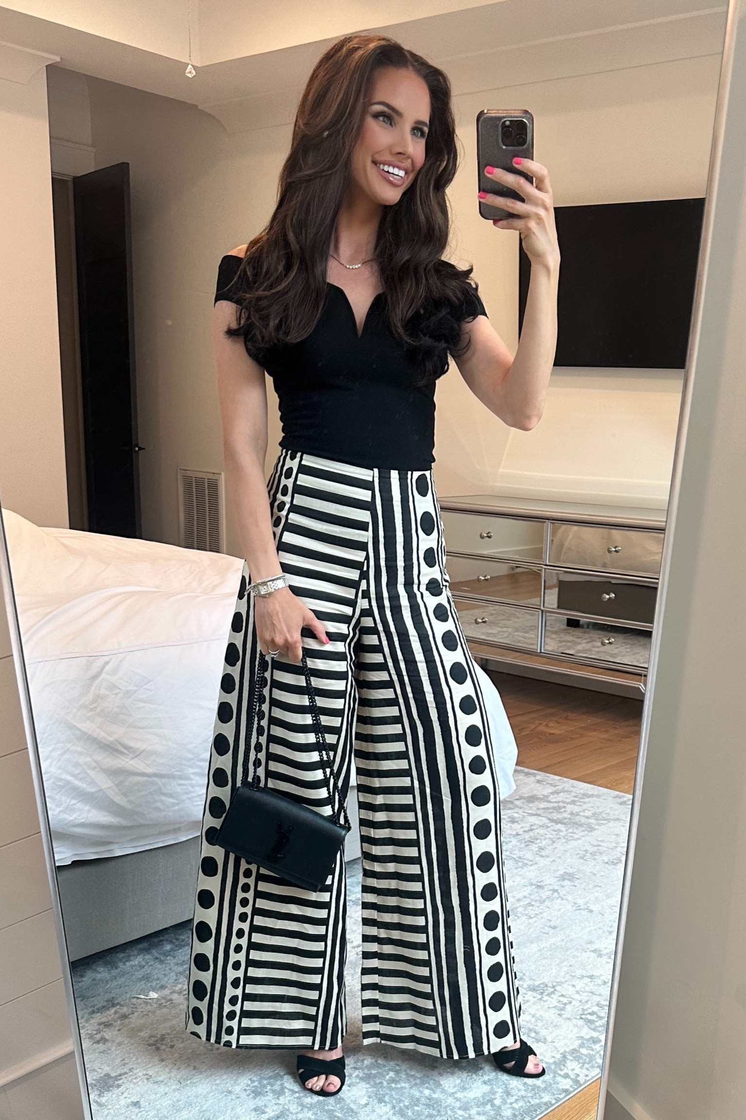 Loving these black and white geometric wide leg pants. Great spring or vacation outfit to dress up or down. Wearing size S in pants. Top is from Express a few years back so I linked some similar tops. 

#LTKStyleTip