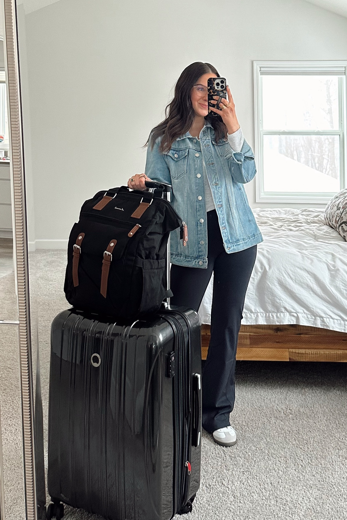 Easy travel outfit - my medium checked luggage is on sale!! Love this brand, lasts forever! 

M top, s flared leggings, size down .5 in sneakers 

Adidas samba denim jacket Abercrombie 

#LTKsalealert #LTKSeasonal #LTKtravel
