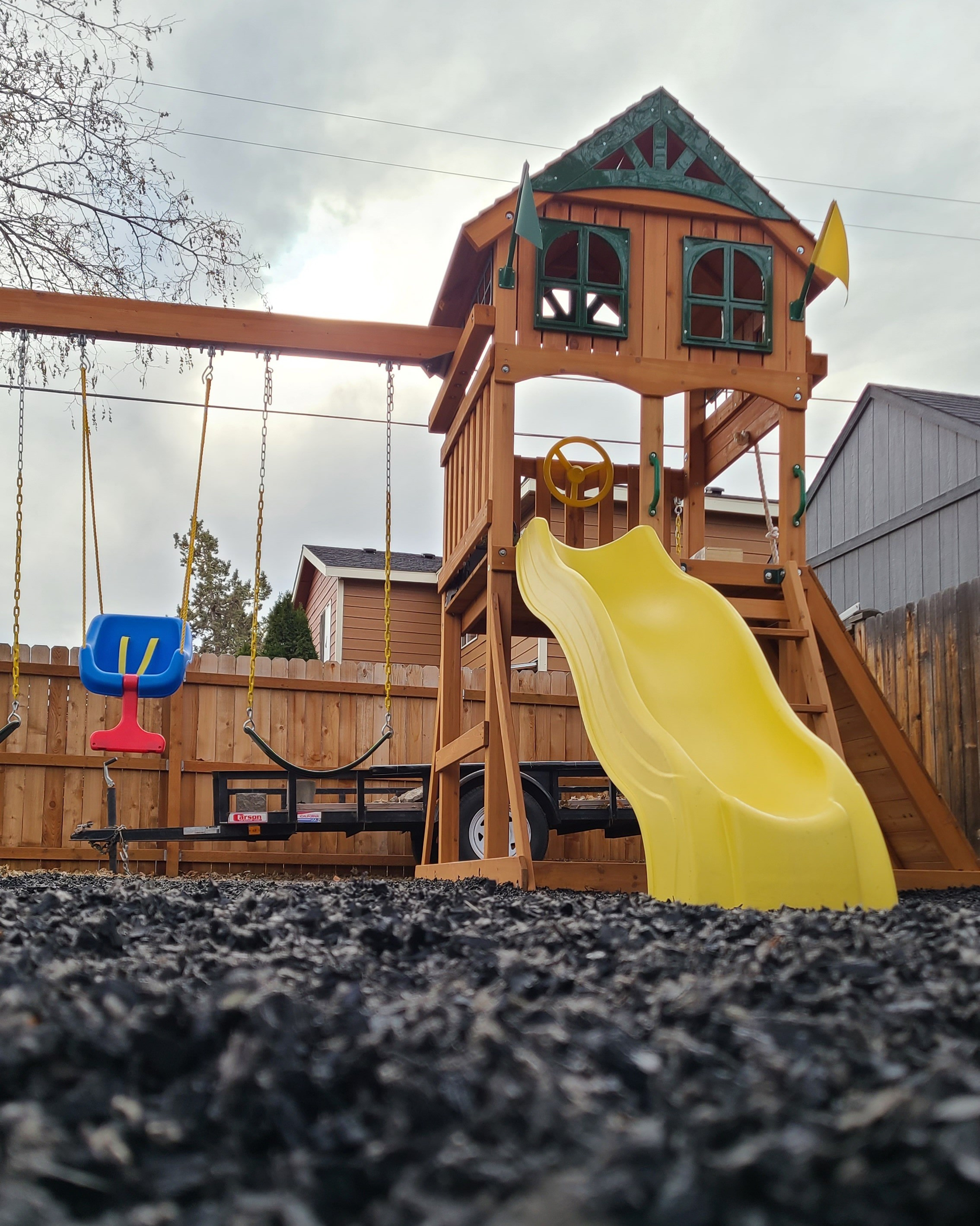 Swings, rock wall, treehouse, slide, sand pit. The backyard is officially their favorite place.  

 #LTKHome