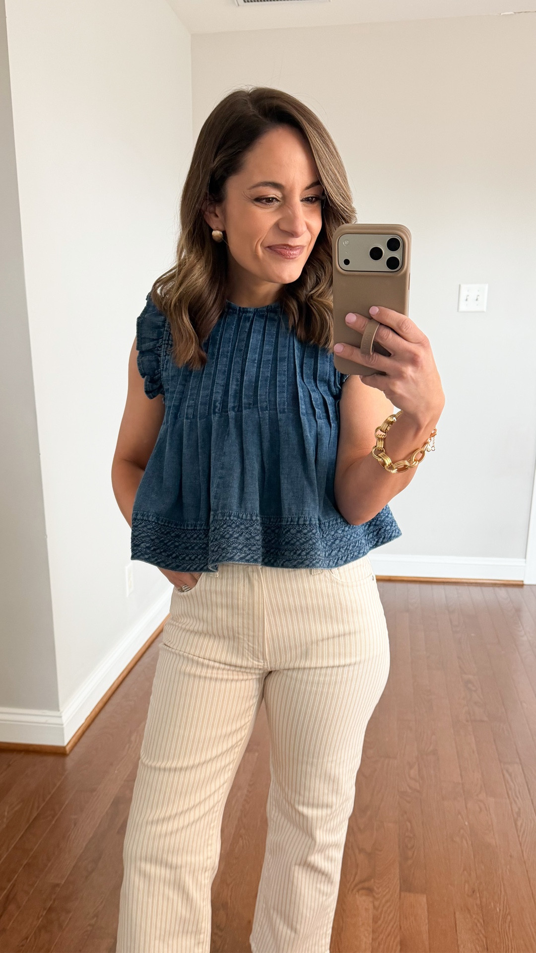 Love this cropped top from Anthropologie. Great fit at the arm opening, cropped fit that hits the top of high rise jeans. Im wearing it in xxs. 

Jeans: petite 24 - tts 10.5” rise, 25.5” inseam 

#LTKSeasonal