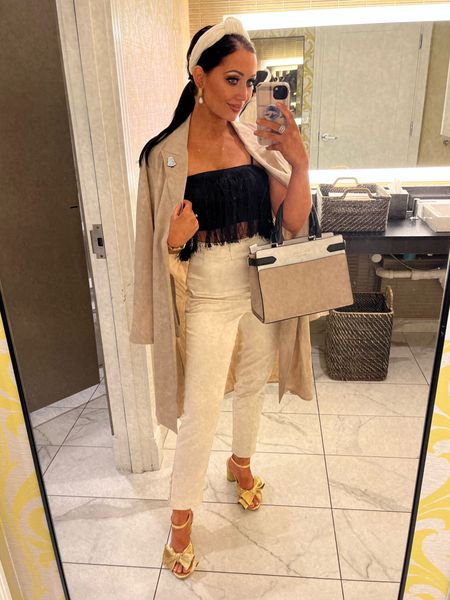 Last night’s dinner look 🧥🤍 pants are from an OOS asos set but linked everything else! 

Amazon | LR dupes | trench coat | date night | fringe top | 

#LTKstyletip #LTKunder100 #LTKshoecrush