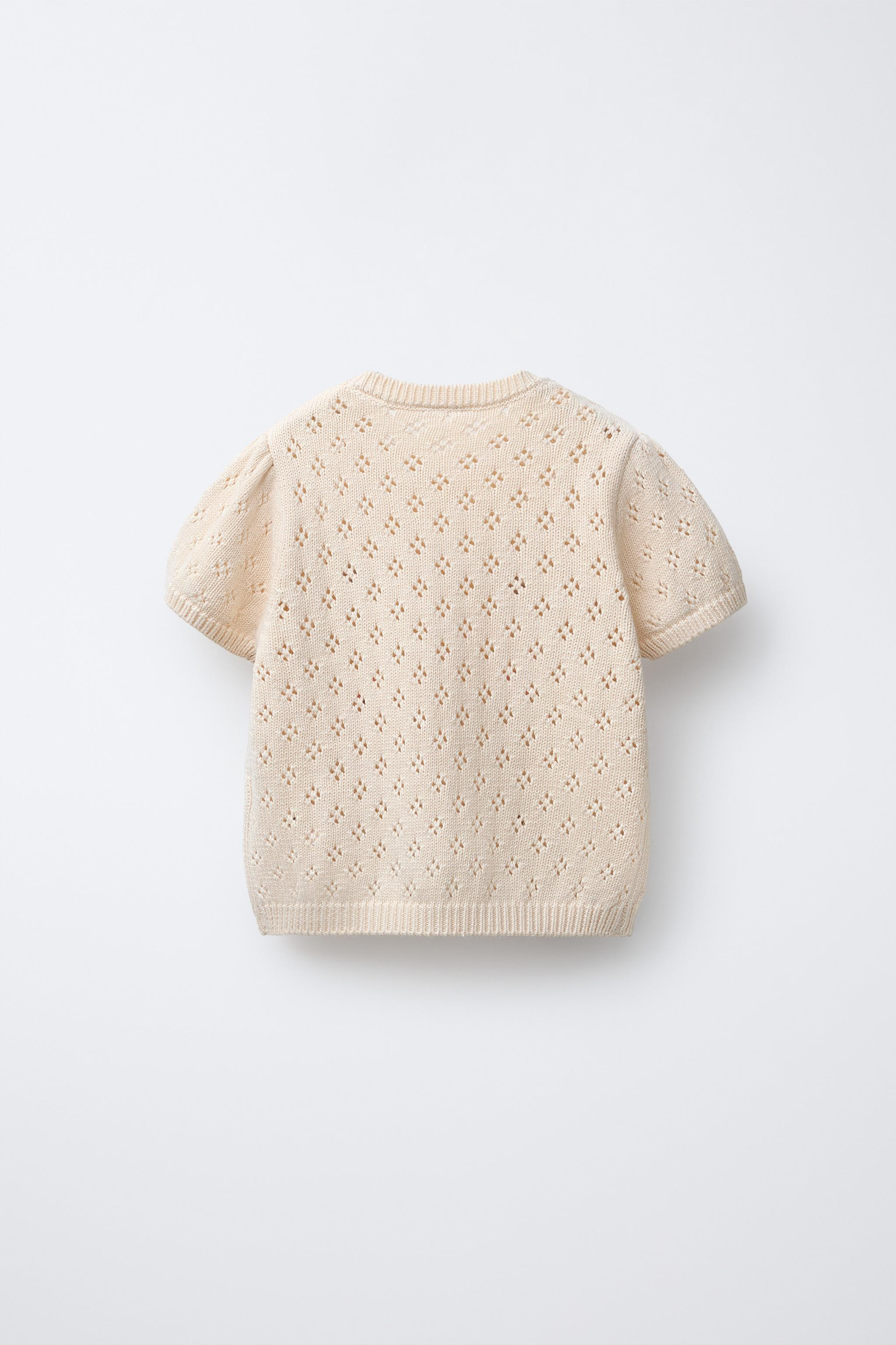 Denim Bermuda skirt with adjustable inner waistband and crossover snap button closure. Front pock... | Zara US