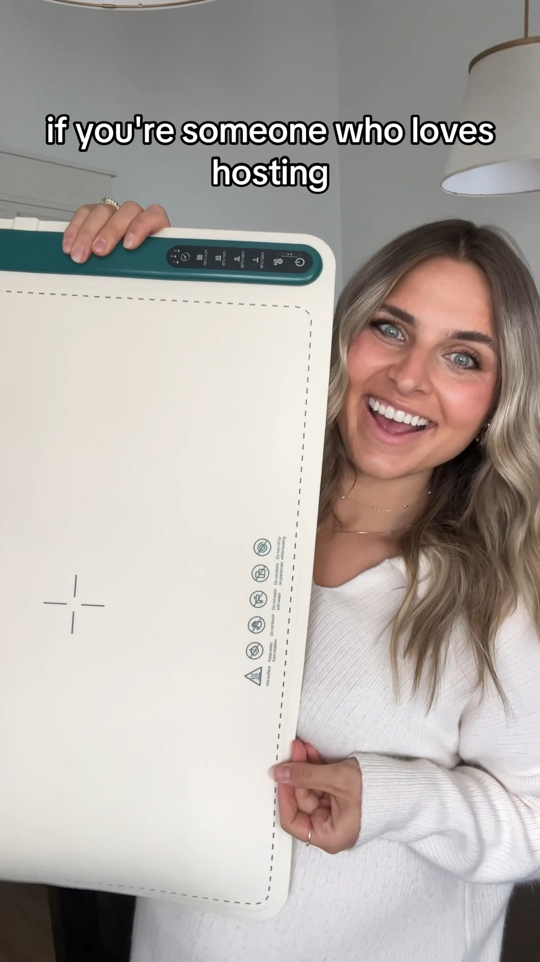 This warming mat would be so perfect for the Super Bowl, dinner parties, or just keeping a dish warm that's ready earlier than others!