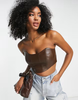 NA-KD faux leather corset top in brown | ASOS (Global)