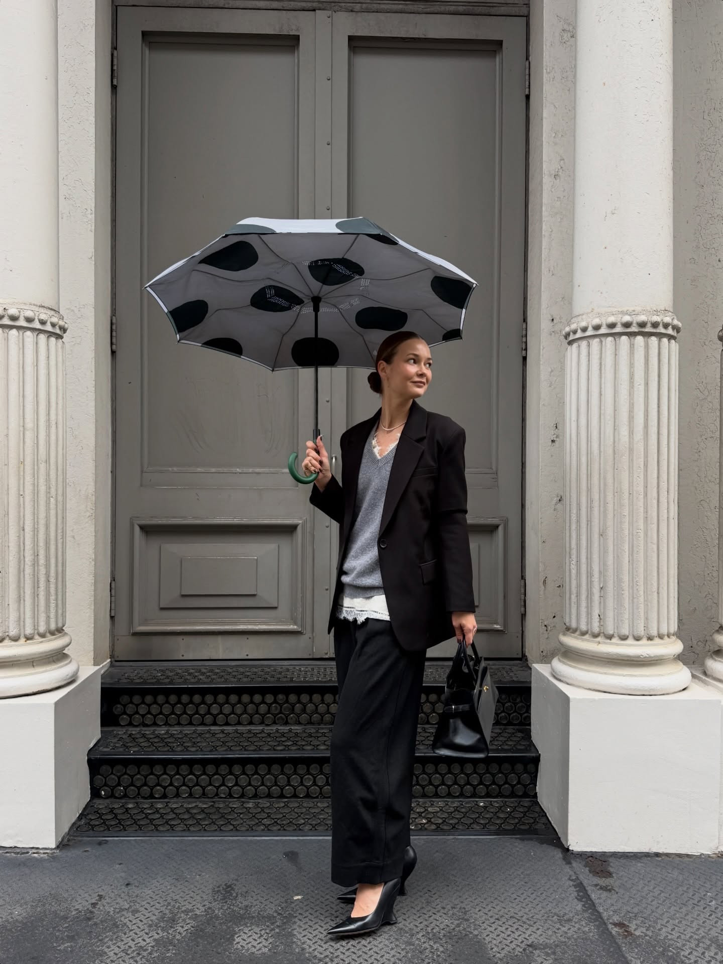 rainy days in soho but make it chic with my new favorite accessory: the beau by @brelladay #ad