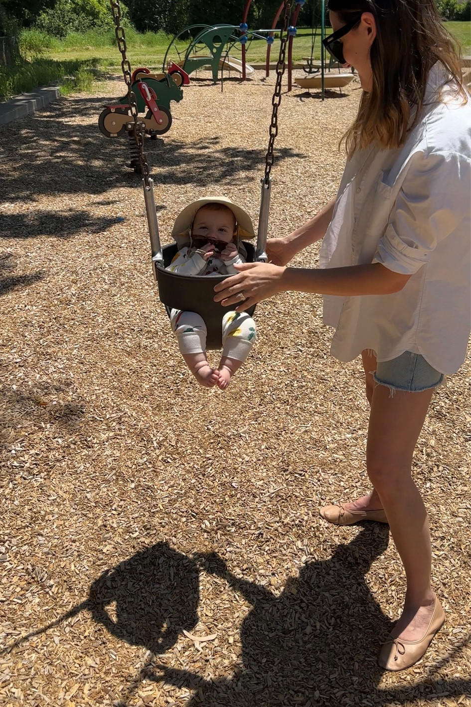 Summer outfits for a day at the park:   

Mom: denim shorts (love the longer length + looser fit; I have my larger size in these) white tee, button-up and comfy flats. 

Baby: onesie, baby sunglasses & hat 

#LTKstyletip #LTKfamily #LTKSeasonal