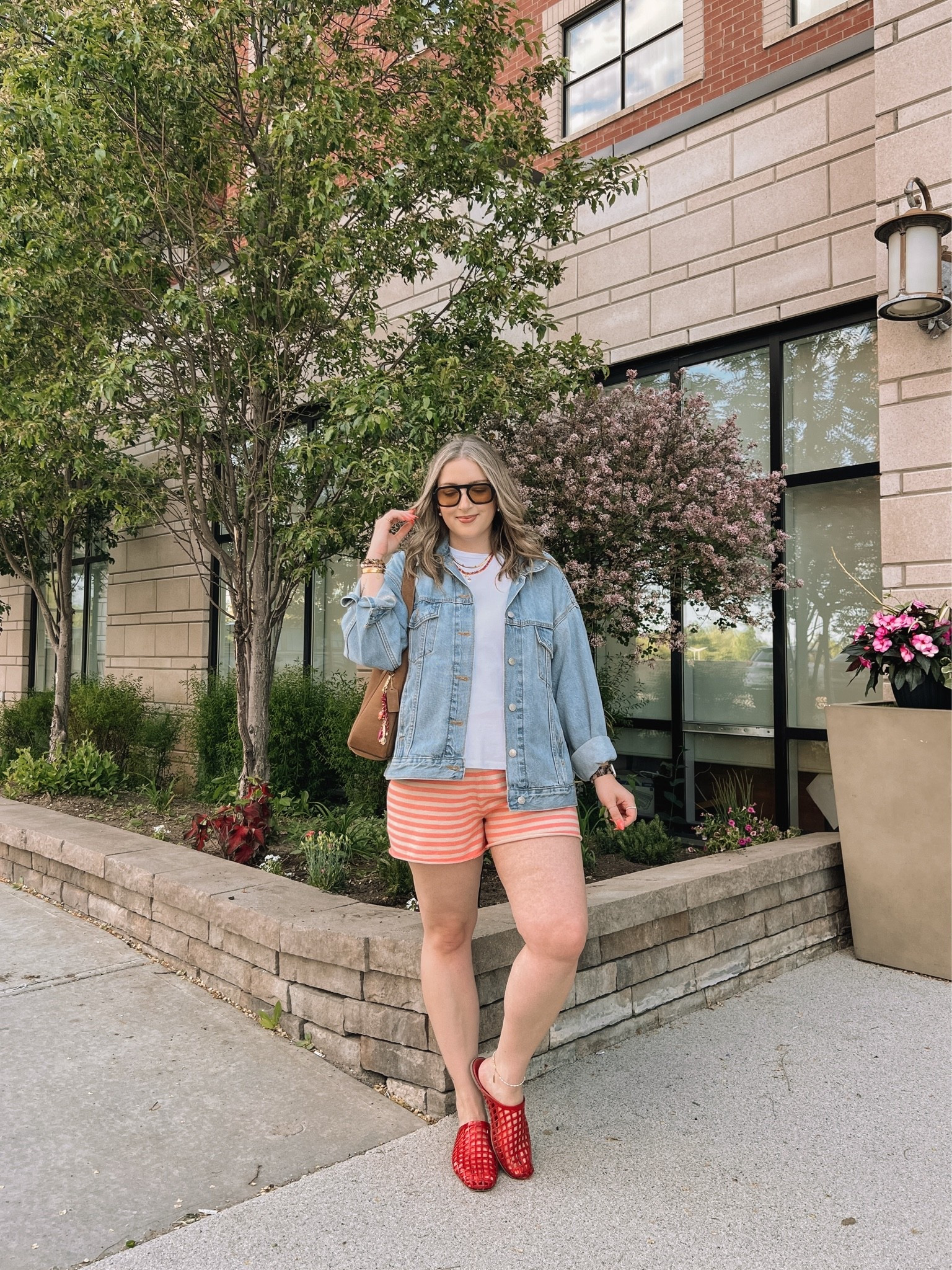 Comfy spring to summer outfit! Wearing my usual L in the striped knit shorts. Sized up to XL in the denim jacket for an oversized fit. Linked similar white tees. Jelly shoes are quite comfy, I’m a 9.5-10 and wear a 10. Canadian shoe link under “similar products”

#LTKsummer #LTKmidsize #LTKstyletip