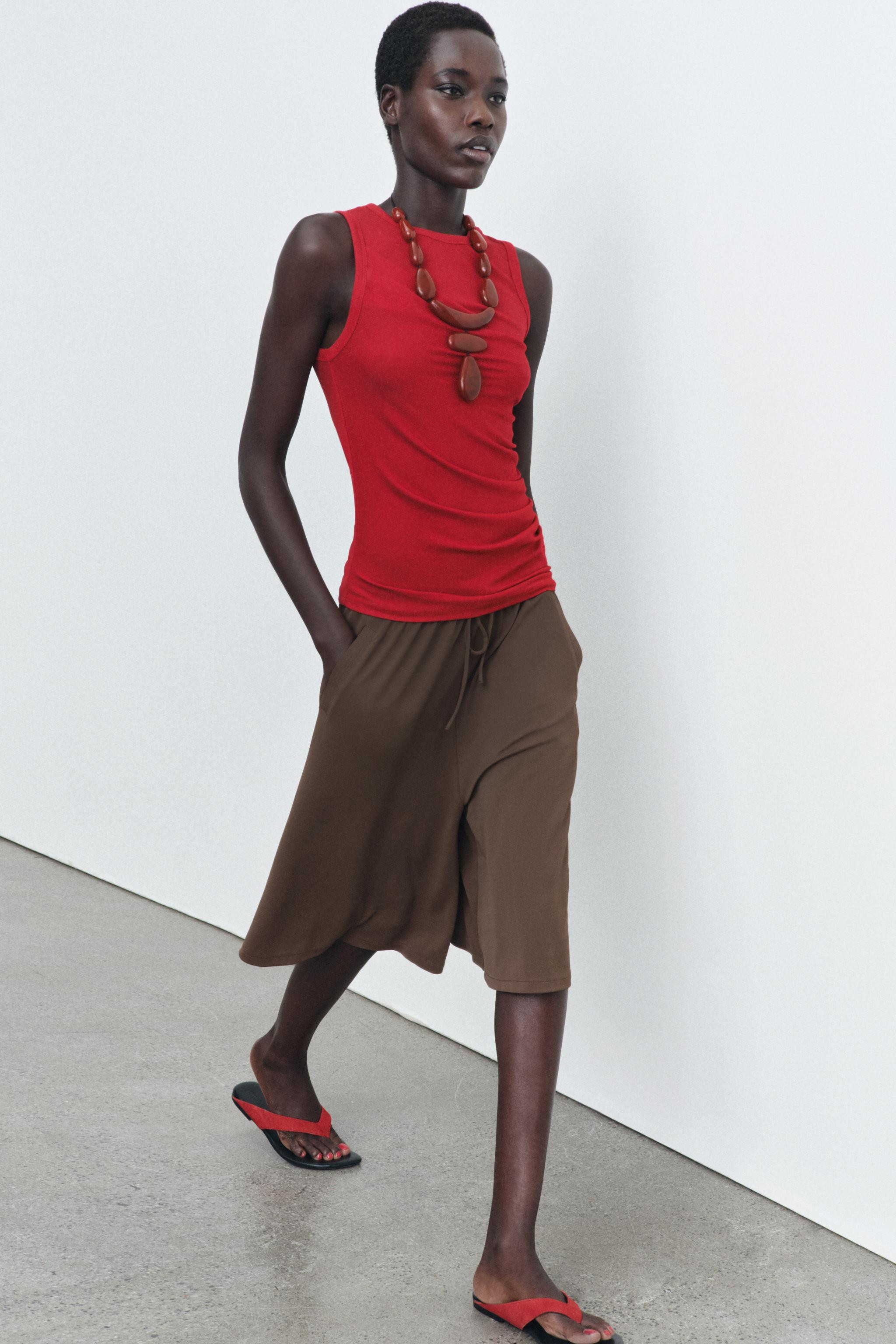 Round neck, sleeveless top. Draped front. Straight hem. | Zara US