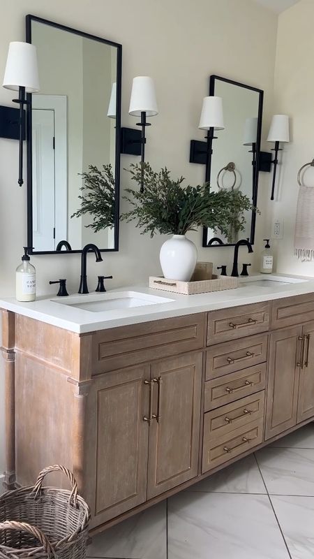 FYI vanity comes with marble countertop , we swapped it out for a custom white quartz countertop.

Bathroom, bathroom inspo, bathroom vanity, bathroom lighting, vanity light, sconce, wall sconce, shaded sconce, bathroom faucet, black mirror, wall mirror, vanity mirror, bathtub, freestanding tub, hand towel, neutral bath towel,  bath towel, bathroom decor, decor, home decor, tub faucet, champagne bronze hardware, drawer pull, vase, tray, tile, amazon, Amazon finds 

#LTKFind #LTKsalealert #LTKhome