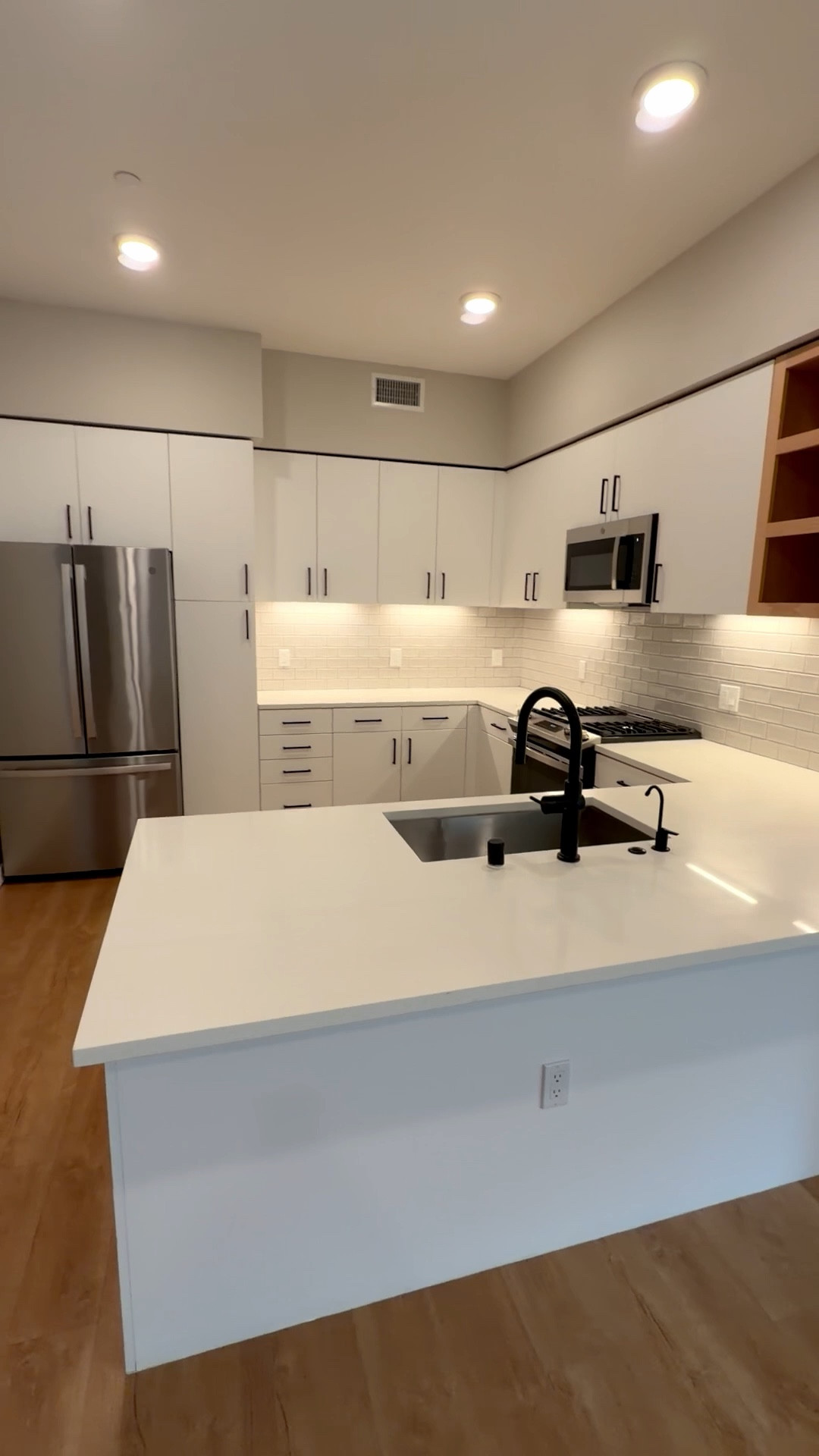 Kitchen styling in progress 🤍 I’m deciding between these neutral bar stools to warm up the space and add texture to the island. Love how natural wood tones soften white cabinets + black hardware. Both options are linked here on my LTK ✨

#LTKHome