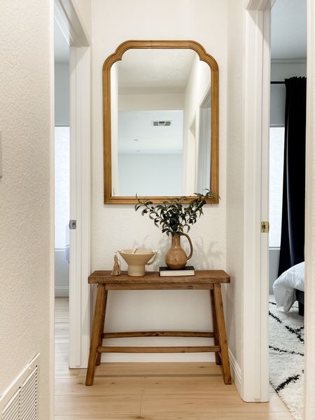 Organic modern hallway decor 
Golden pretzel mirror 
Distressed bench 


#LTKstyletip #LTKhome #LTKunder100