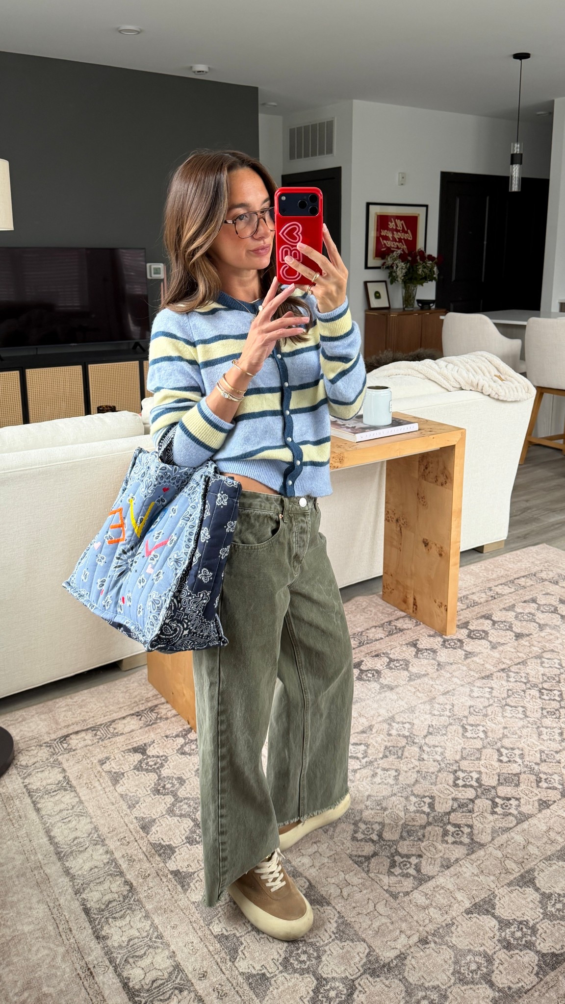 Small sweater 24 jeans! Abercrombie are super similar! Shoes are Golden Goode sabot, tote is the medium sizee