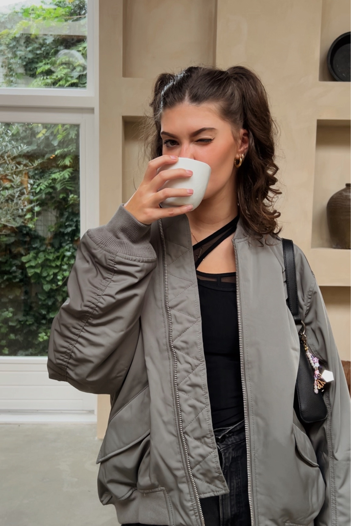 oversized bomber jacket, grey bomber, pig tails, fall/winter, autumn outfit inspiration, fall outfit 2023, black unique top, weekday, coffee outfit, style inspiration, daily look 

#LTKeurope #LTKstyletip #LTKworkwear
