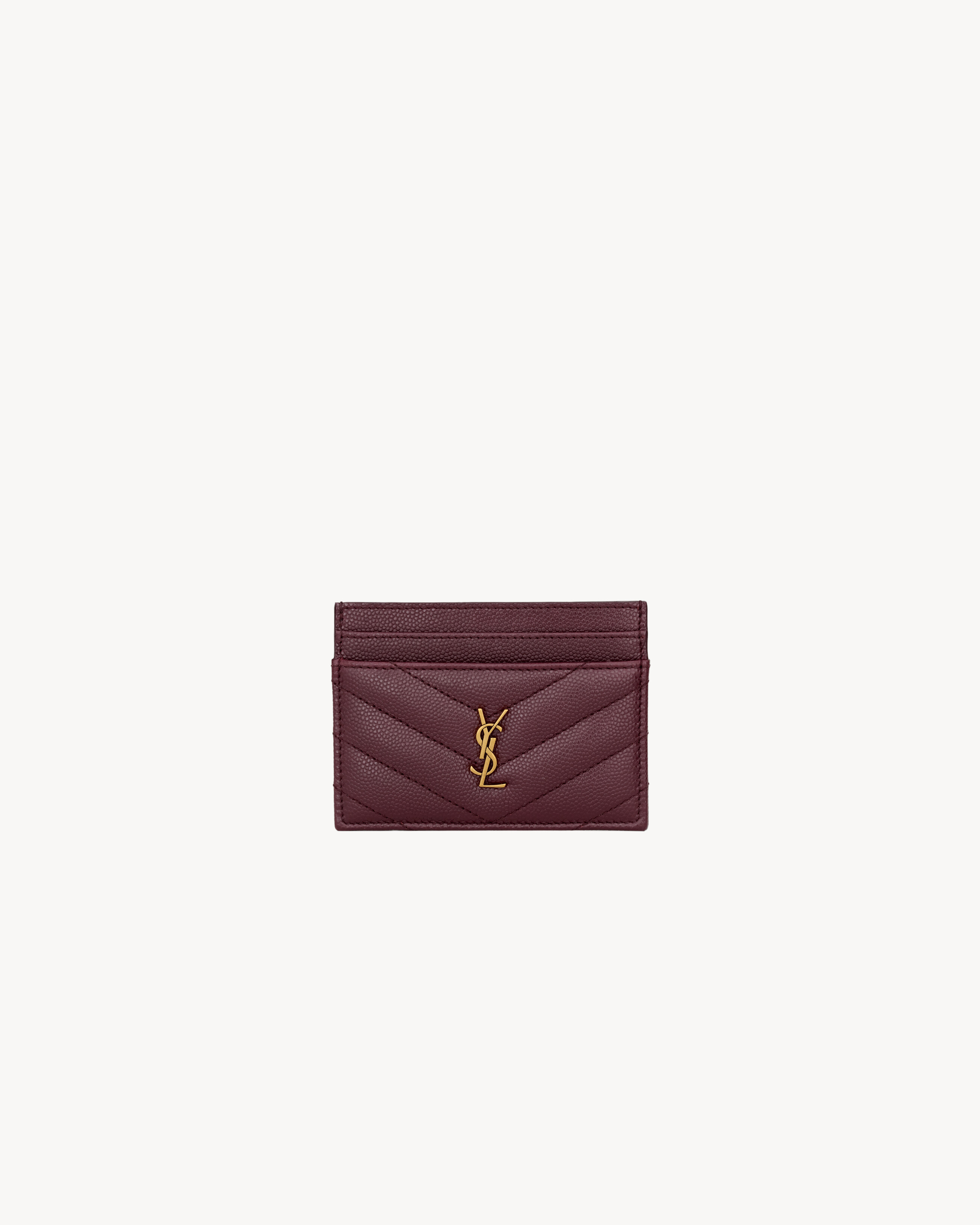 card holder decorated with the CASSANDRE and quilted topstitching. | Saint Laurent Inc. (Global)