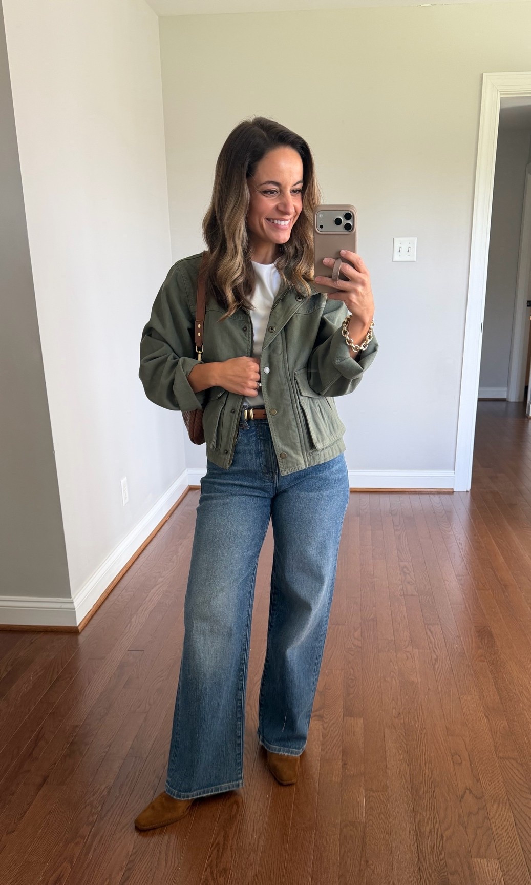 Another great pair of jeans on sale this weekend! If you’re looking for jeans that hold their shape well through wear I highly recommend Madewell jeans. Of all of my brand I feel like these keep their shape the best. 

Love the way these jeans look with boots! 

Madewell Perfect Vintage Wide Leg: petite 24 - 10 3/8” rise 28” inseam 

Summer 
T-shirt (Old Navy): xs 
Poncho (Free People) 
Bag (Polene Un Nano) 

Transitional outfits / early fall outfits / petite jeans