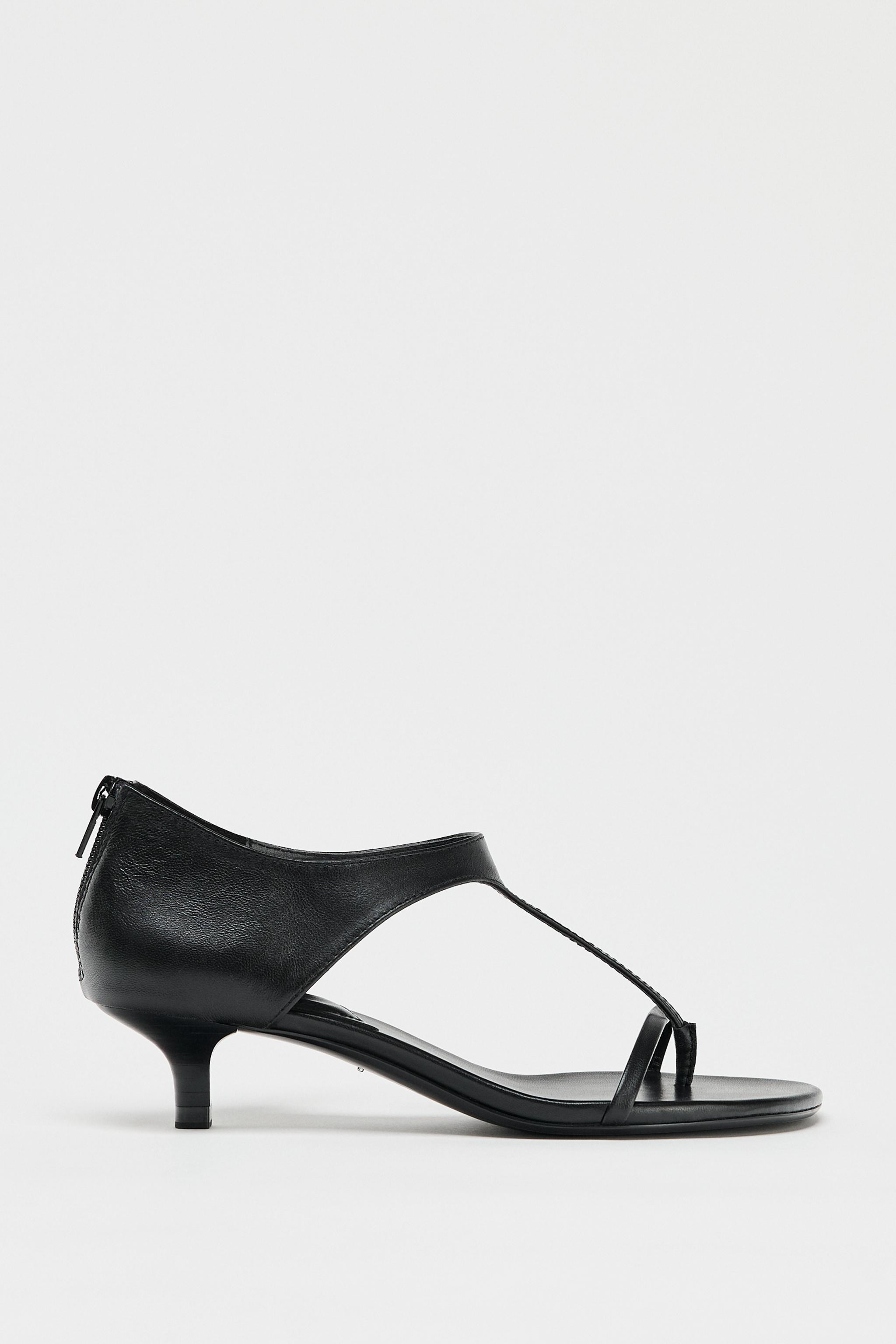 Leather strappy sandals. Toe loop strap. Low kitten heel. Thin front strap. Back zipper closure. ... | Zara US