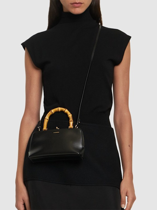 Mini Goji leather top handle bag | Luisaviaroma